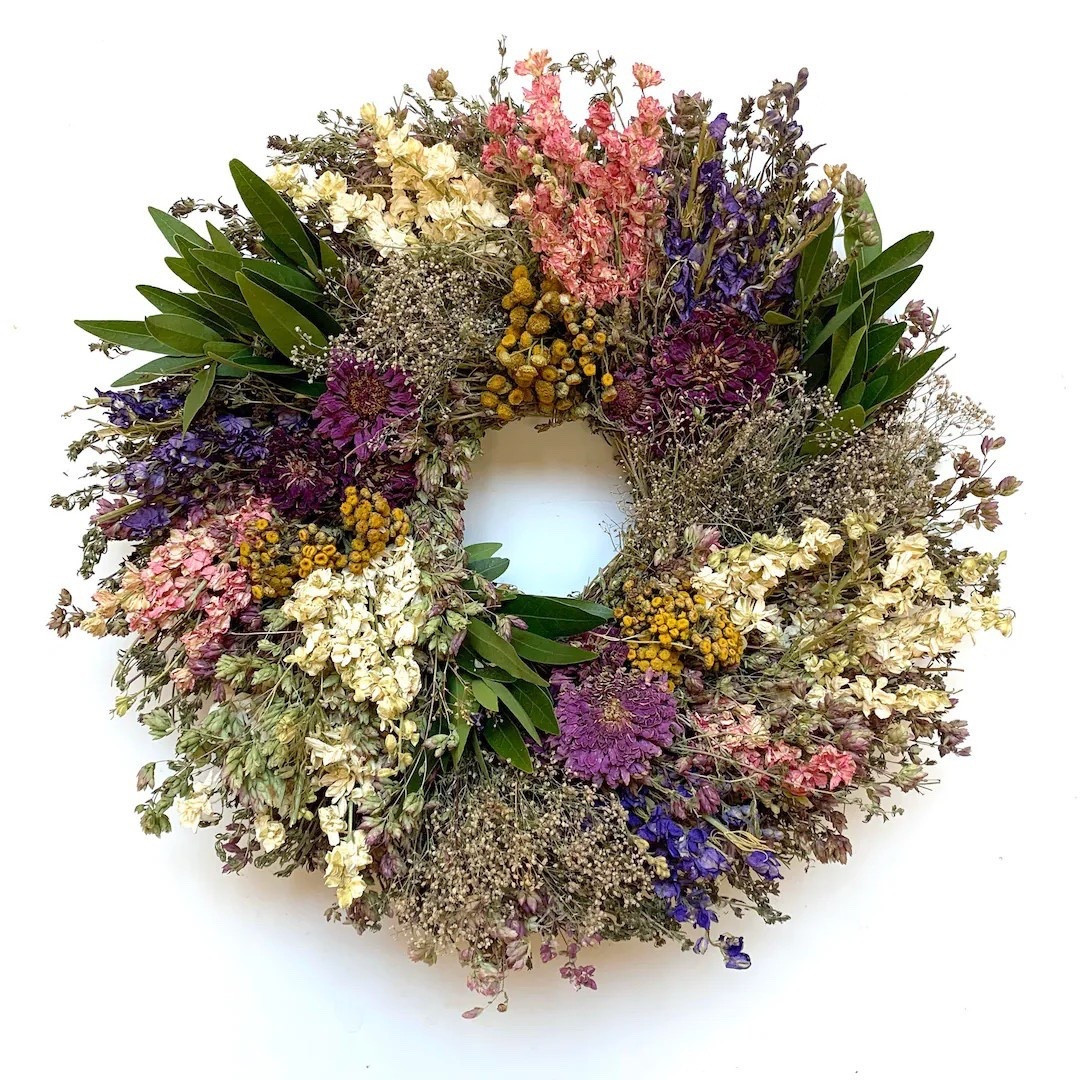 Welcome the season with this vibrant farm-grown dried flower wreath, filled with tansy, zinnias, larkspur, and fragrant herbs for a naturally beautiful display. Handcrafted on a family farm, this colorful 16-inch wreath brings texture, charm, and long-lasting spring beauty to your door, wall, or entryway. A thoughtful gift or seasonal décor piece that feels fresh and inviting year-round.

#LTKHome #SpringWreath #DriedFlowerWreath #FarmhouseDecor #FloralDecor #HomeDecorFinds #FrontDoorDecor #NaturalDecor #SustainableDecor #LTKFinds #FarmhouseStyle #SeasonalDecor #RusticDecor #HomeStyling #EverlastingFlowers 

#LTKSeasonal #LTKHome #LTKWedding