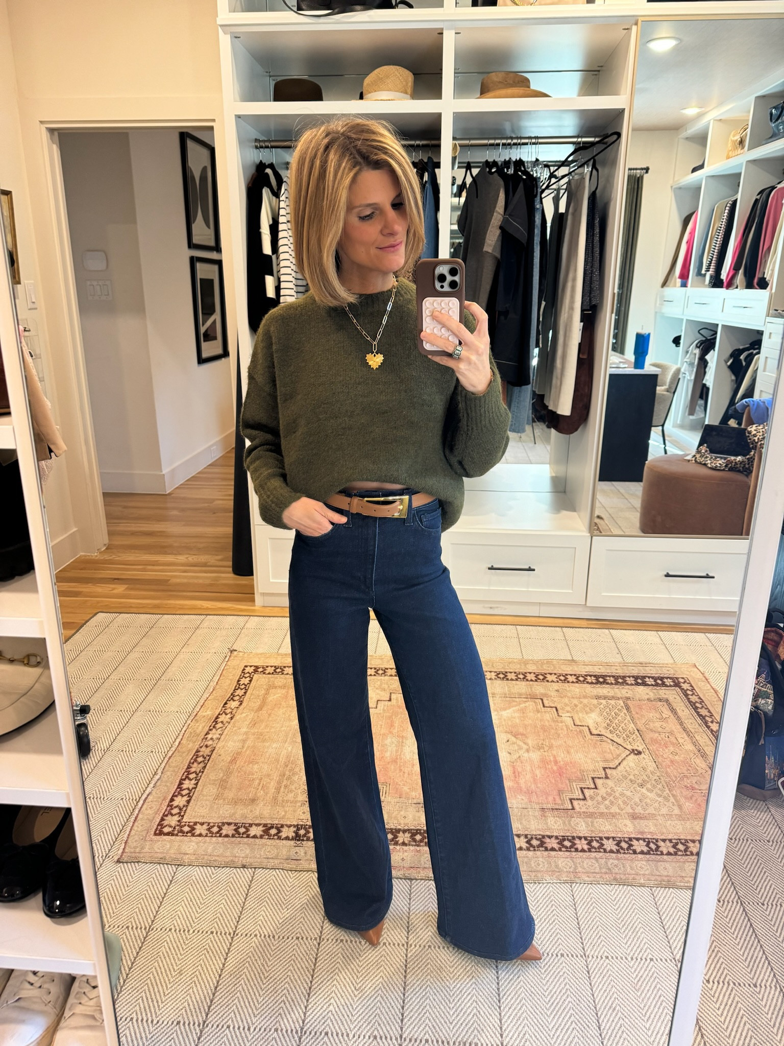 Wearing XS in sweater. Cut my jeans for length 