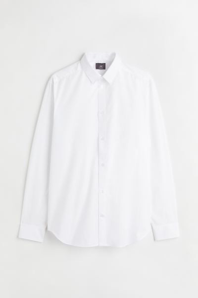 Conscious choice  Shirt in woven fabric with an easy-iron finish. Turn-down collar, classic butto... | H&M (US + CA)