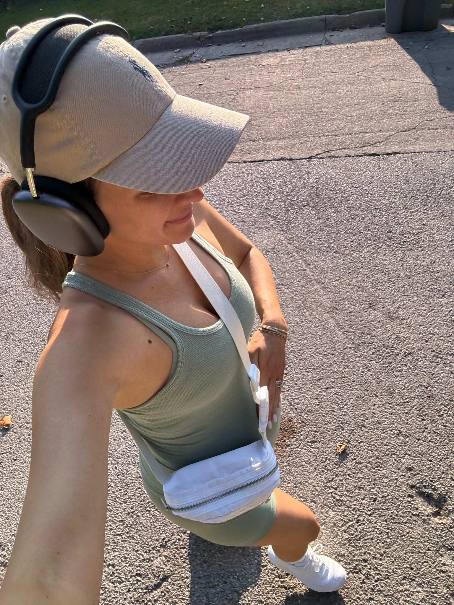 Walking OOTD🤍 I love this new color I got! Sized up 1 in the shorts and 2 sizes in the bra & tank! My sneakers are lululemon too  


#LTKFitness #LTKBump #LTKActive