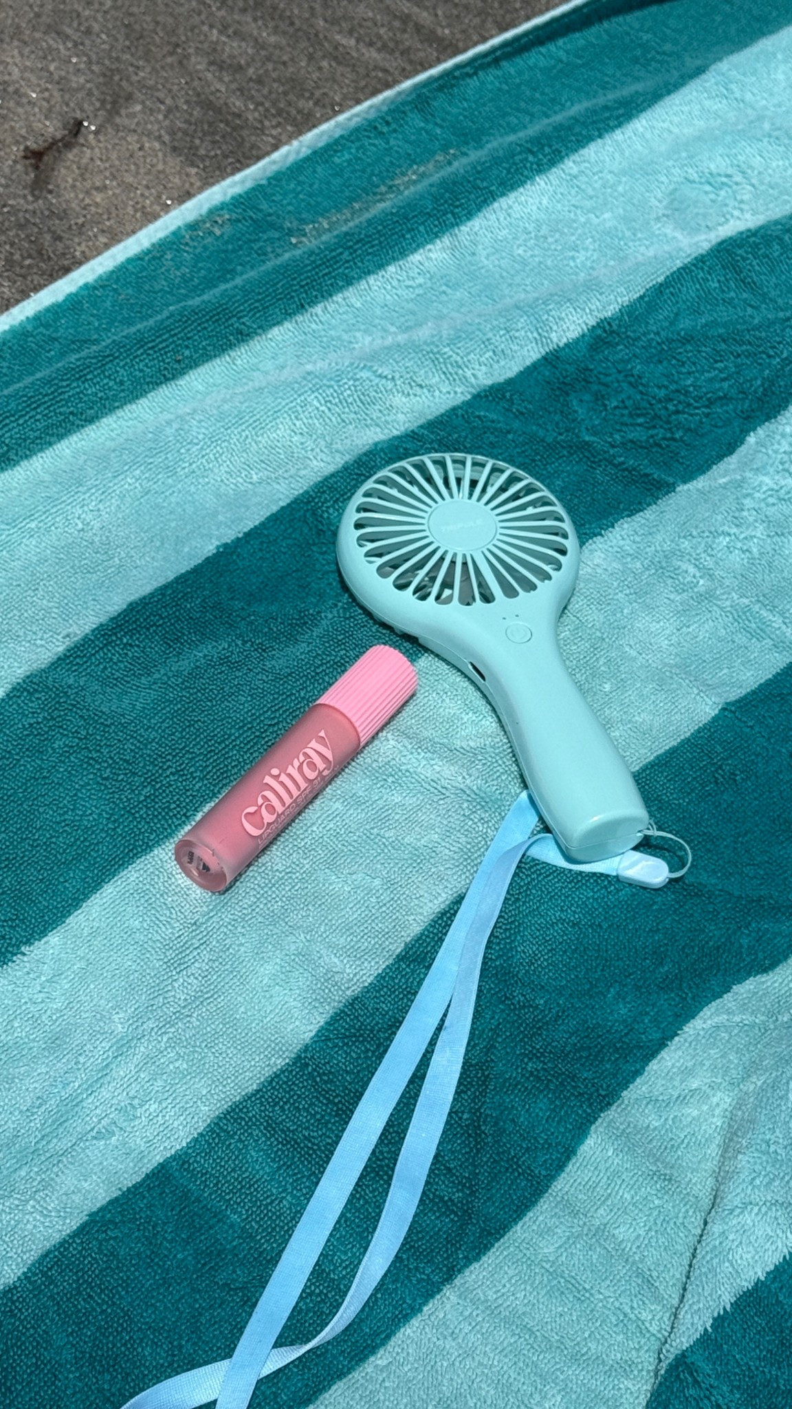 Obsessed with the Cali Ray spf lip gloss! And of course my trusty fan 🏝️ 

#LTKFindsUnder100 #LTKBeauty #LTKFindsUnder50