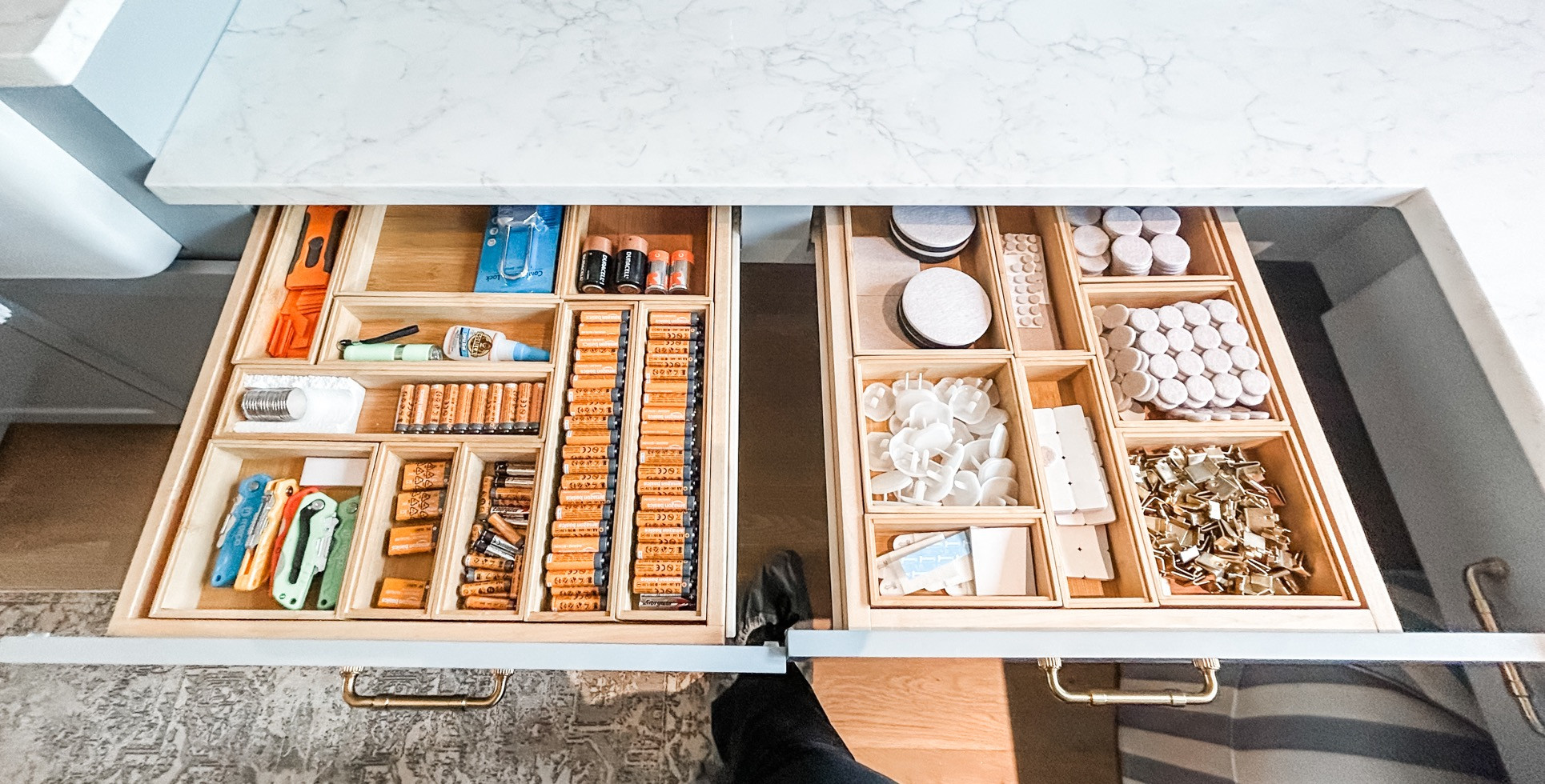 We can't imagine organizing utility drawers without drawer organizers. These bamboo ones are perfect because they match style-wise and they fit together to create the perfect solution for all this small stuff! 

 