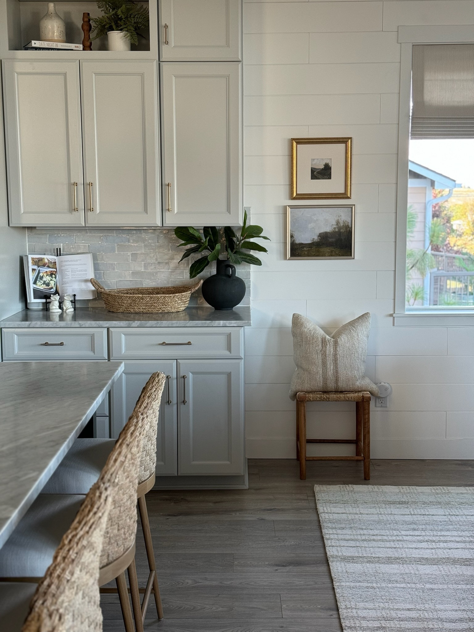 I love this little corner of our kitchen! This exact stool is an old target one but I linked similar. I love the stacked art, and all the texture you can see in this space! 

#LTKStyleTip #LTKHome