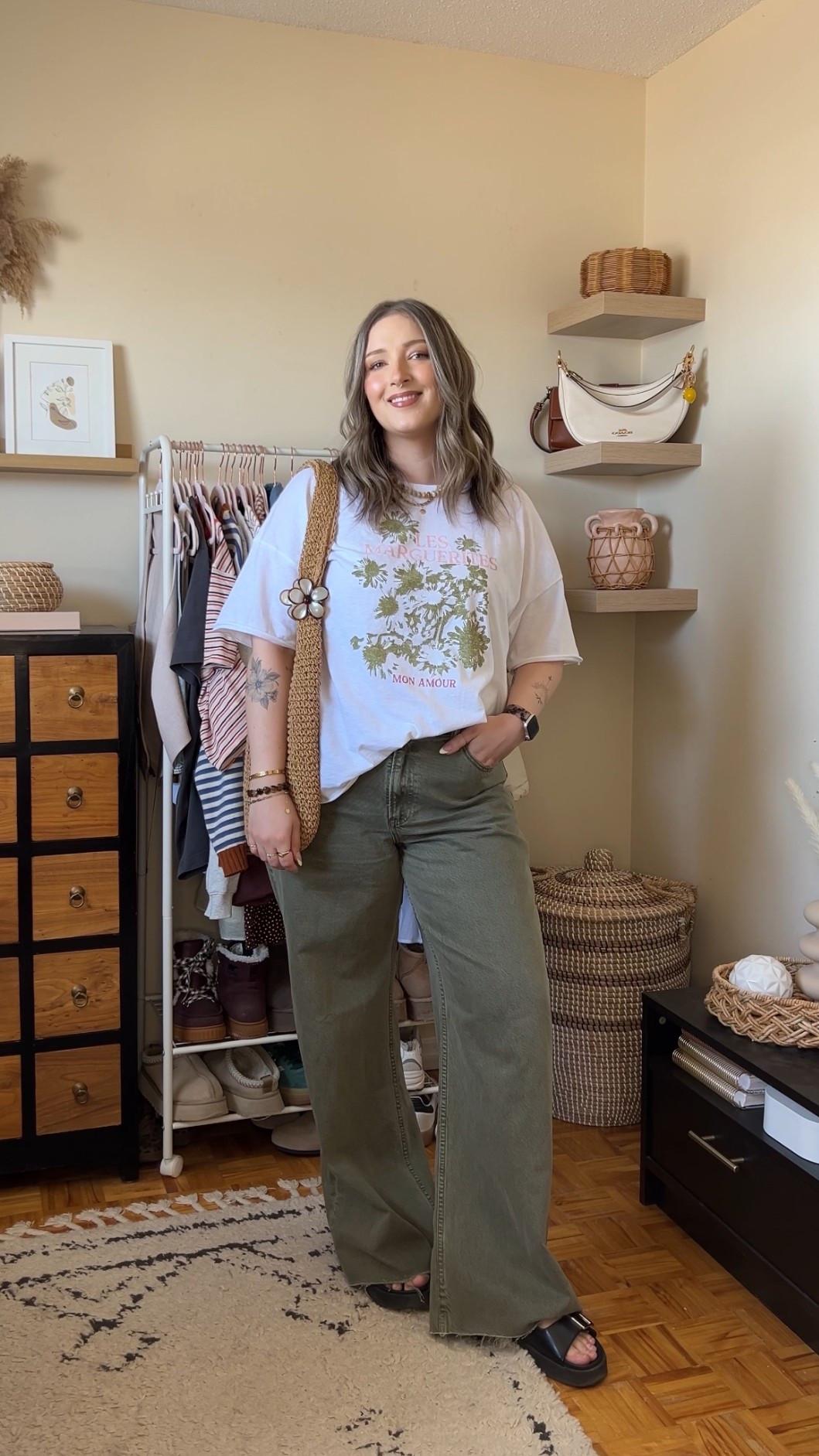 Casual spring outfit! Wearing L in the tee and 32 long in the jeans (I cut the hem for a custom length. Linked similar black sandals

#LTKjeans #LTKmidsize #LTKsummer