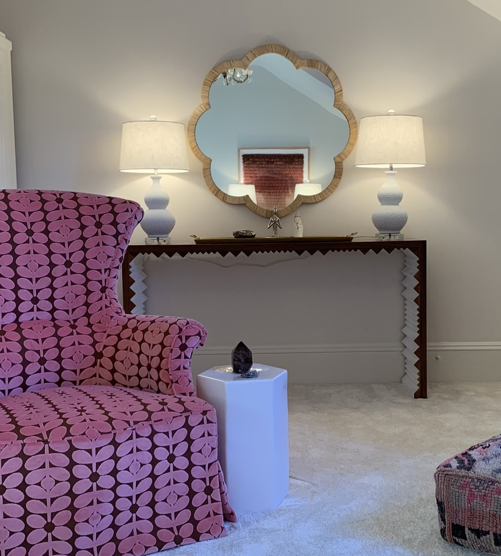 Step into the Opal Blush Haven, a dreamy sanctuary designed to envelop you in warmth, softness, and ethereal beauty. Layers of blush and cream velvets create a cocoon of comfort, their sumptuous textures inviting you to sink in and unwind. A plush soft shag rug adds to the indulgence, while earthy, organic woods and natural textures ground the space with a sense of serenity.

Above, delicate pom-pom mobiles dance lightly in the air, drawing the eye to the heart of the haven—a velvet-draped tent, a cozy retreat where daydreams unfold and tranquility reigns. Every element is carefully curated to balance elegance and ease, crafting a space that feels as enchanting as it does restorative. 

 #LTKHome