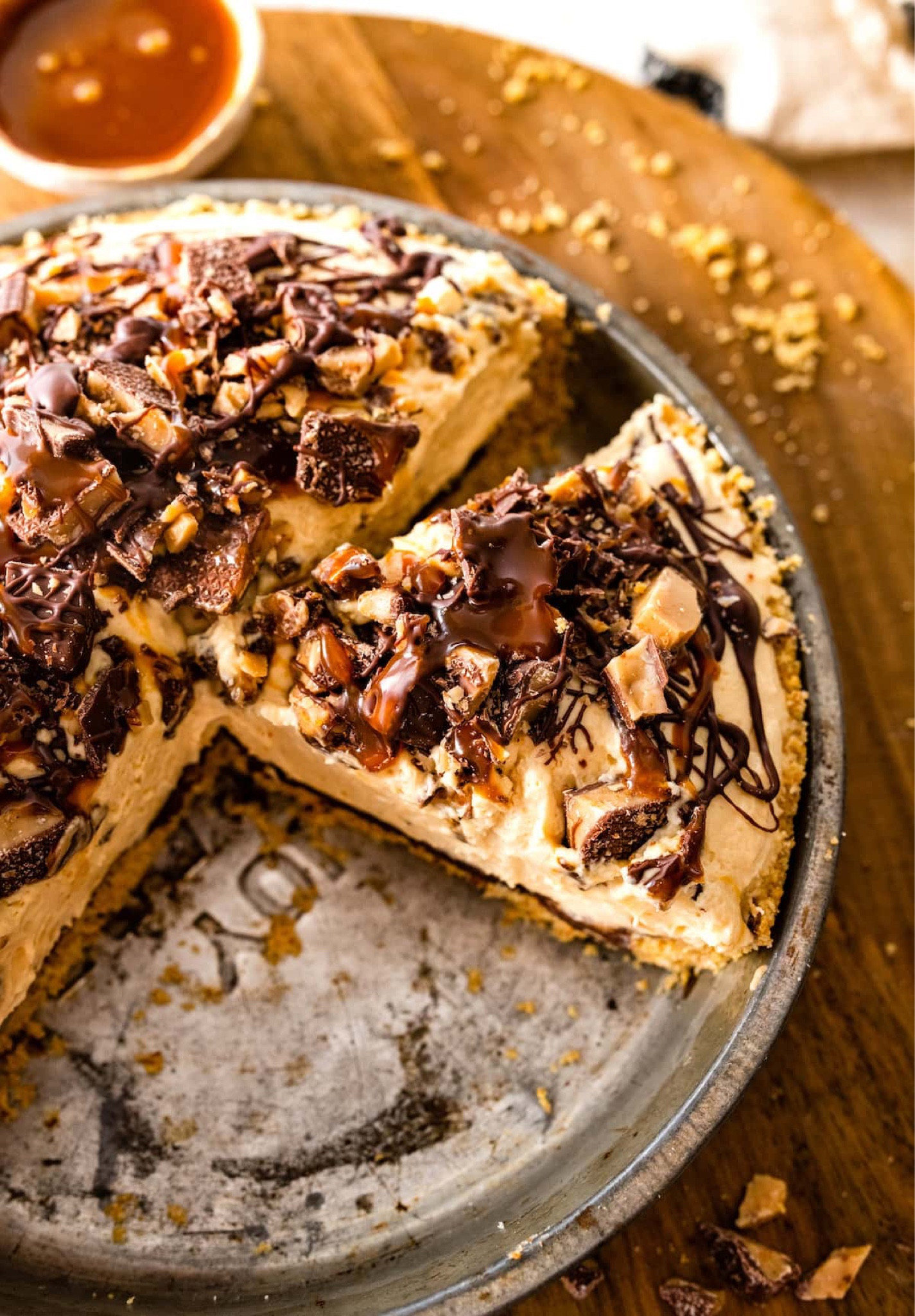 This no-bake Salted Caramel Toffee Pie is a decadent dessert that combines the rich flavors of salted caramel, chocolate, and toffee with a buttery graham cracker crust. Full recipe on my blog at TwoPeasAndTheirPod.com

#LTKFindsUnder100 #LTKHome #LTKSeasonal