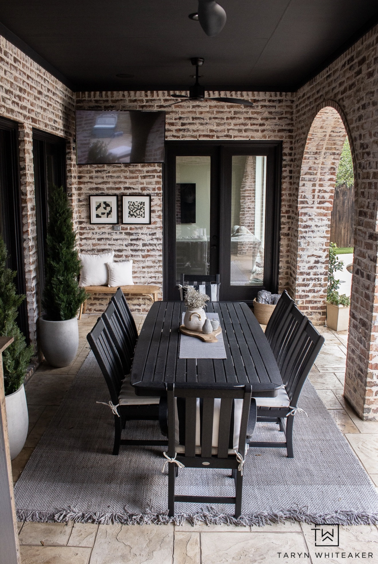 This covered patio dining space is such a dream for entertaining. The brick arches, black ceiling, and classic outdoor table create a space that feels cozy, elevated, and perfect for hosting.

covered patio dining, outdoor dining space, brick patio design, backyard entertaining area, outdoor table and chairs, covered outdoor patio, patio decorating ideas, neutral outdoor decor, outdoor living space, backyard patio inspiration

#LTKSeasonal #LTKHome