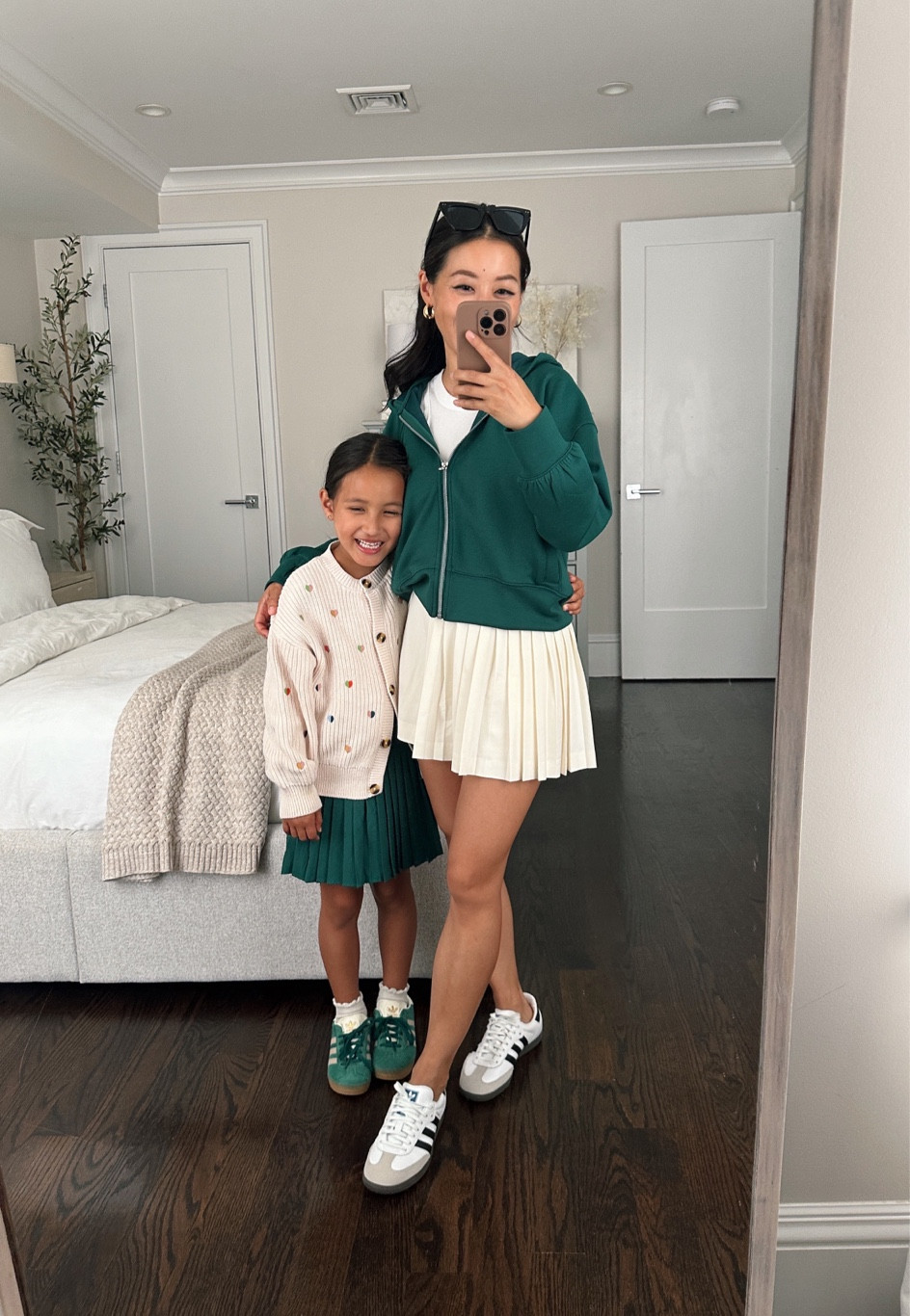 Abercrombie sale! Nori asked for a skirt like mine… (PS their kids sizing goes up to 17/18 which is like a women’s S / M)

• I’m in Abercrombie skort xxs , Madewell tank xxs, and Abercrombie green kids hoodie 13/14 (loose fit on me, like Xs women’s)

• my adidas sambas sneakers are fully restocked in white! TTS to slightly big for some 

• nori is in Abercrombie skort 5/6. I am tempted to get the same skort in a big kids size!

Nori’s cardigan is from France and not linkable 

• kids adidas sneakers and target socks 

#LTKtravel #LTKfindsunder50 #LTKkids