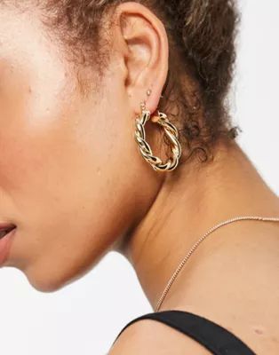 ASOS DESIGN hoop earrings in twist design in gold tone | ASOS (Global)