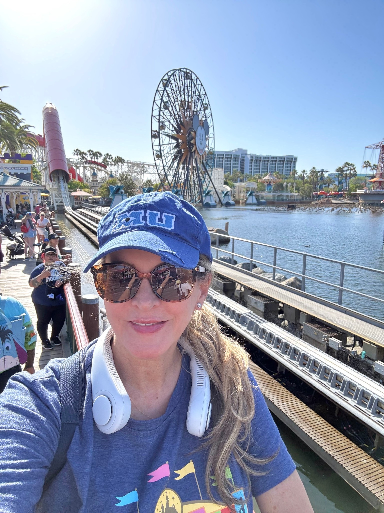 Once again this rechargeable neck fan was my favorite accessory of the day. Hands free quiet sound multiple fan speeds lasts all day.  While everyone else was hot standing in lines I stayed cool. So convenient! Great for travel. 

#LTKmomlife #LTKMothersDay #LTKdayinmylife