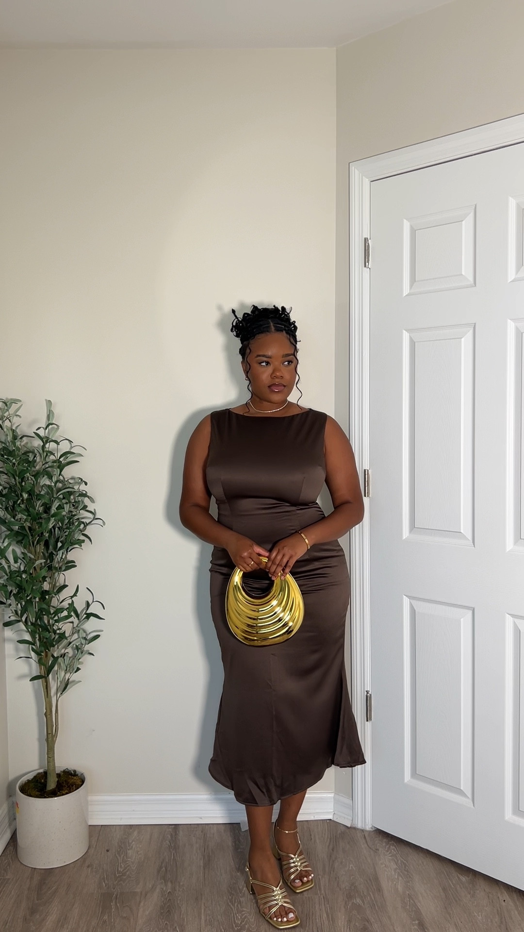 A night out dress— gold metallic bag, gold heels, dark taupe dress and braided updo hairstyle. #curvyfashion #nightoutdress #goldhandbag #goldjewelry

#LTKstyletip #LTKVideo #LTKfindsunder100