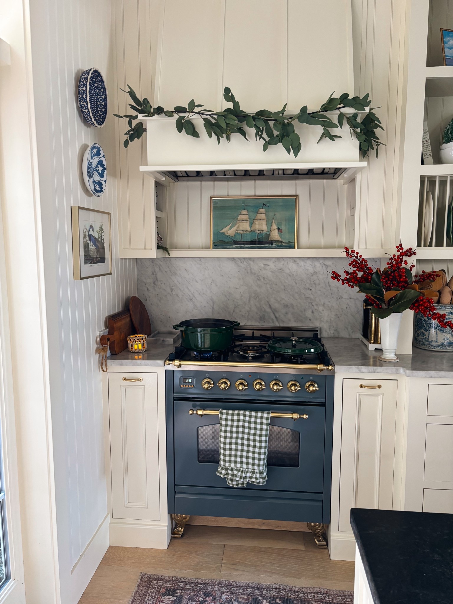 Christmas kitchen - eucalyptus garland, stove, red berries, vase and more 

#LTKHome #LTKHoliday #LTKSaleAlert