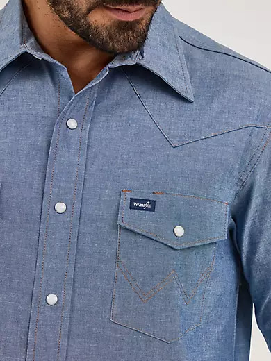 Cowboy Cut® Firm Finish Long Sleeve Western Snap Solid Work Shirt in Chambray Blue | Wrangler
