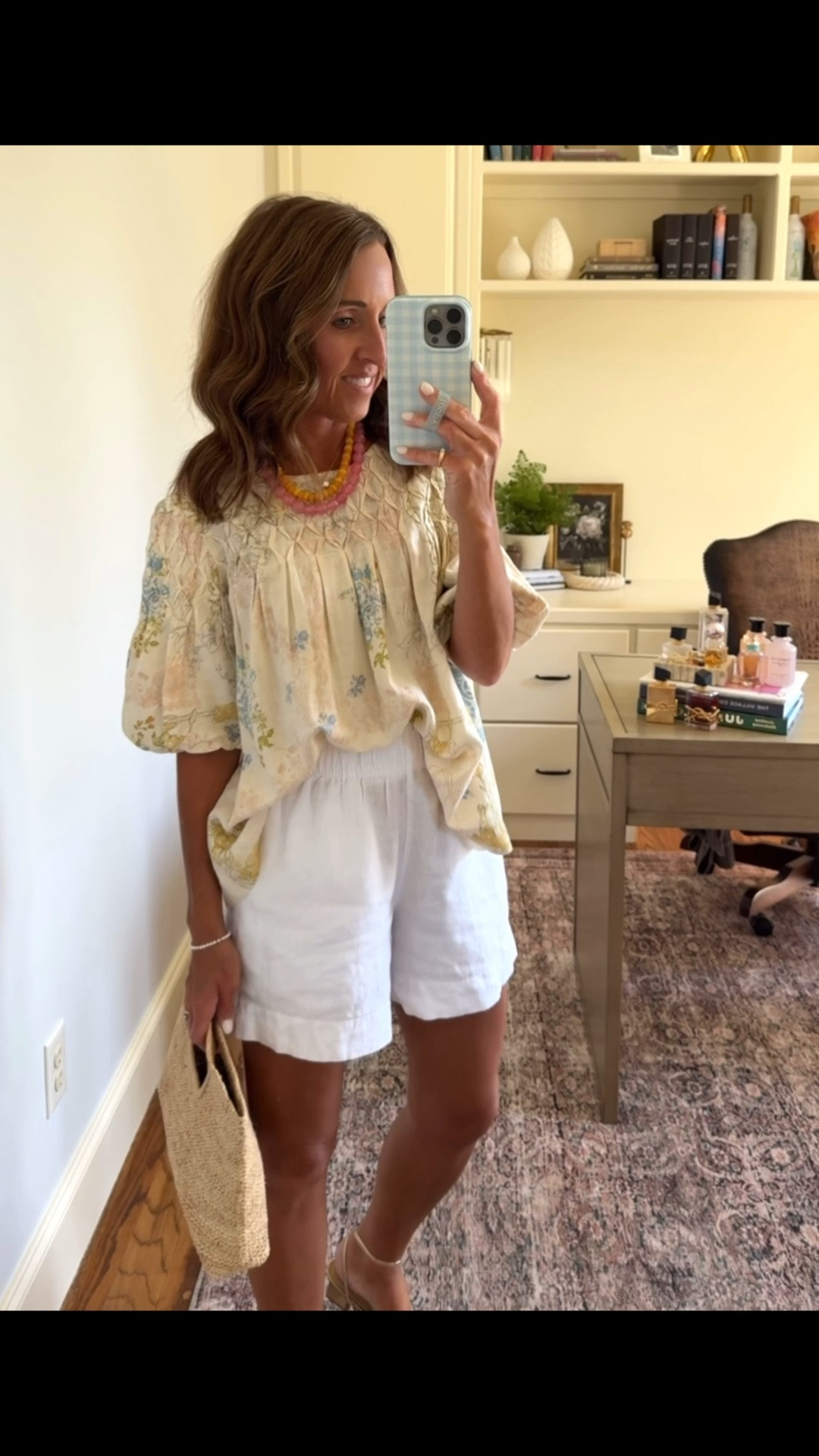 White linen shorts with a flowy smocked blouse. 
Both XS.

#LTKootd #LTKSeasonal #LTKOver40
