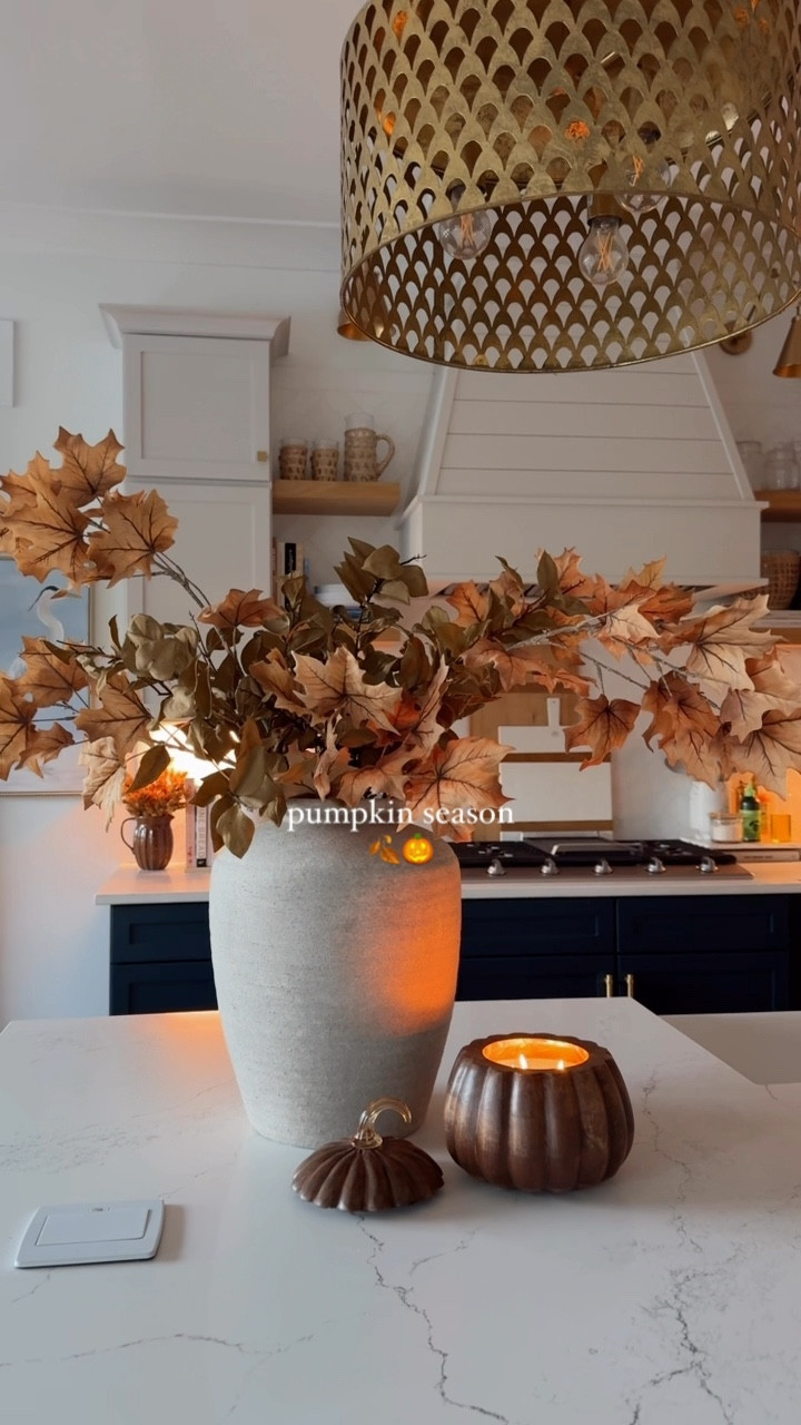 pumpkin season 🍂🎃 | can you believe the vase + stems are all from @hobbylobby, honestly can pass for pottery barn 🤭 the pumpkin candle smells amazing and doubles as decor when not lit, simple + seasonal 🤎

share w/ a friend who loves fall decor 🫶🏼
#falldecor #fallstyle #fallflorals #kitchendecor #seasonaldecor #pumpkinspice #hobbylobbyfinds #anthrohome #boujieonabudget #kitchenisland 

#LTKSeasonal #LTKHome #LTKFindsUnder100
