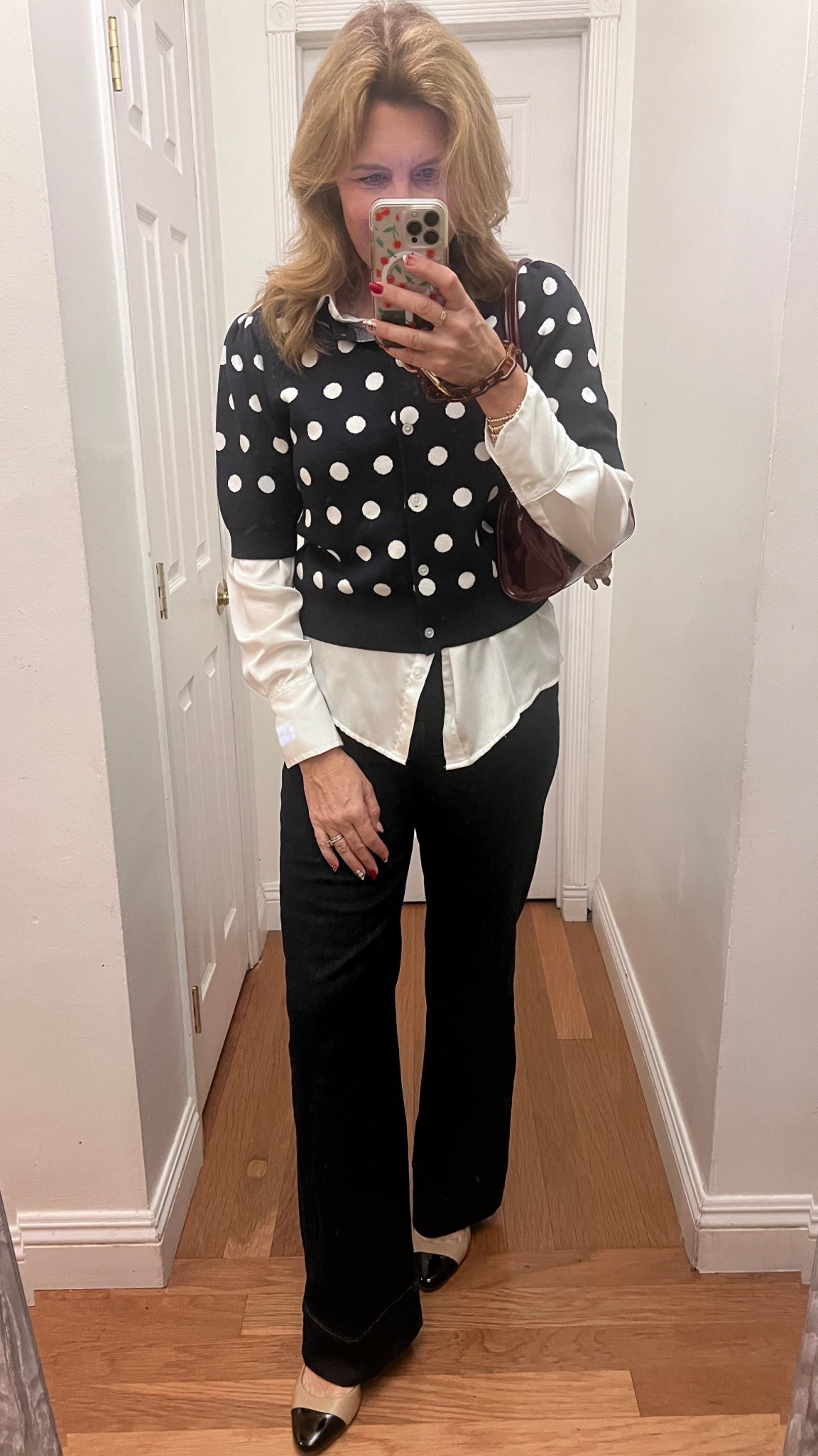 This dot cardigan! 😍 It’s a dark navy. 

#LTKootd #LTKFindsUnder50 #LTKOver40