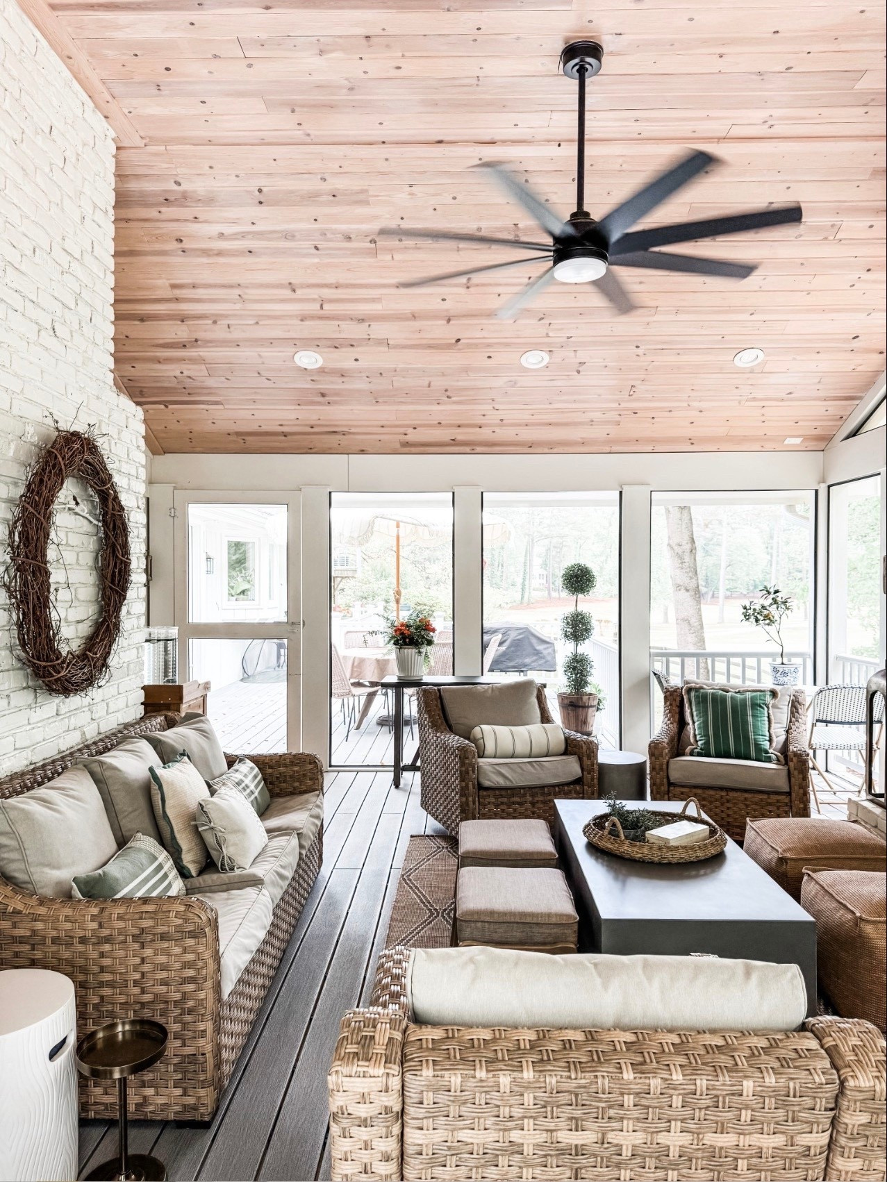 This screened-in porch is the definition of relaxed outdoor living 🤍 Featuring wicker patio furniture, a woven outdoor sofa, rattan lounge chairs, neutral seat cushions, and striped throw pillows, this space is layered for comfort and everyday use. The wood plank ceiling, modern ceiling fan, brick fireplace, outdoor coffee table, ottomans, and woven tray decor tie everything together for a cozy, elevated sunroom-style porch that works year-round.

#eanesinteriors #screenedporch #outdoorliving #wickerfurniture #rattanfurniture #patioinspo #sunroomdecor #neutraldecor #layeredtextures #outdoorsofa #loungeseating #ceilingfan #woodceiling #porchdesign #cozyhome #interiordesign #homeinspo

#LTKOver40 #LTKSeasonal #LTKHome