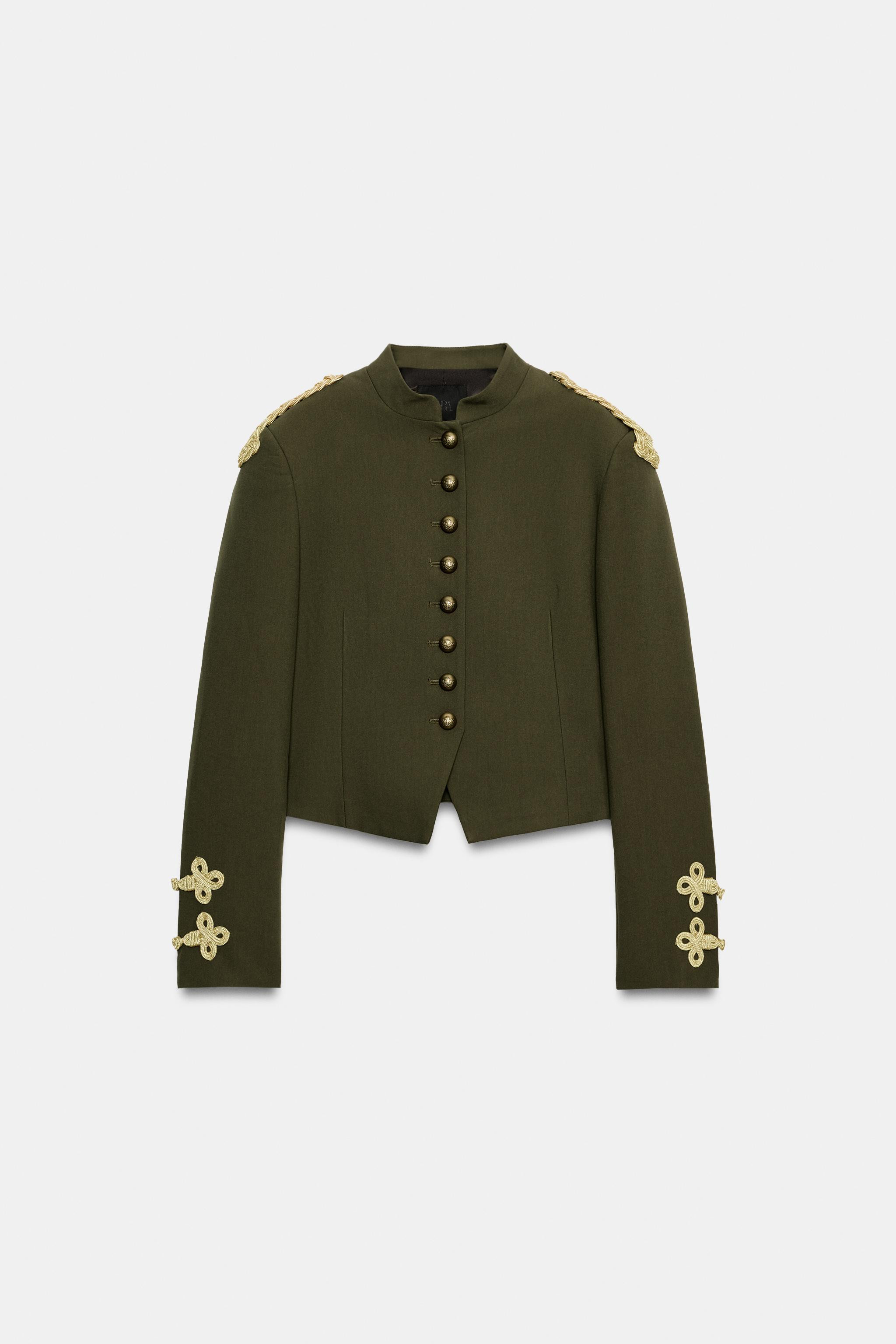 Fitted blazer with a round neck and long sleeves. Featuring contrast embroidered frog fastening d... | Zara IT