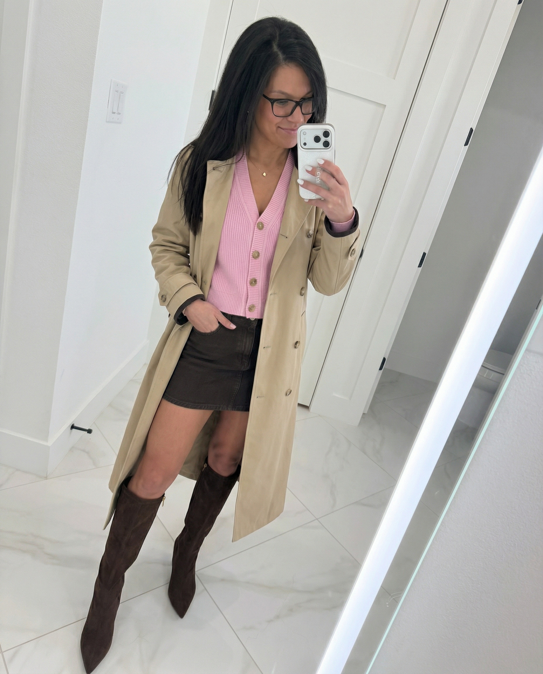 This outfit is effortless chic at its finest 🤎✨

A structured skirt, classic button-down, cozy sweater layered over the shoulders (or styled underneath), and a timeless trench coat — finished with boots for that polished, put-together vibe.

#LTKstyle #LTKfinds #ChicStyle #TrenchCoat #SkirtOutfit #FallStyle #LayeredLook #BootsOutfit #MinimalChic #EverydayElegance #WomensFashion #TimelessStyle

#LTKWorkwear #LTKPetite