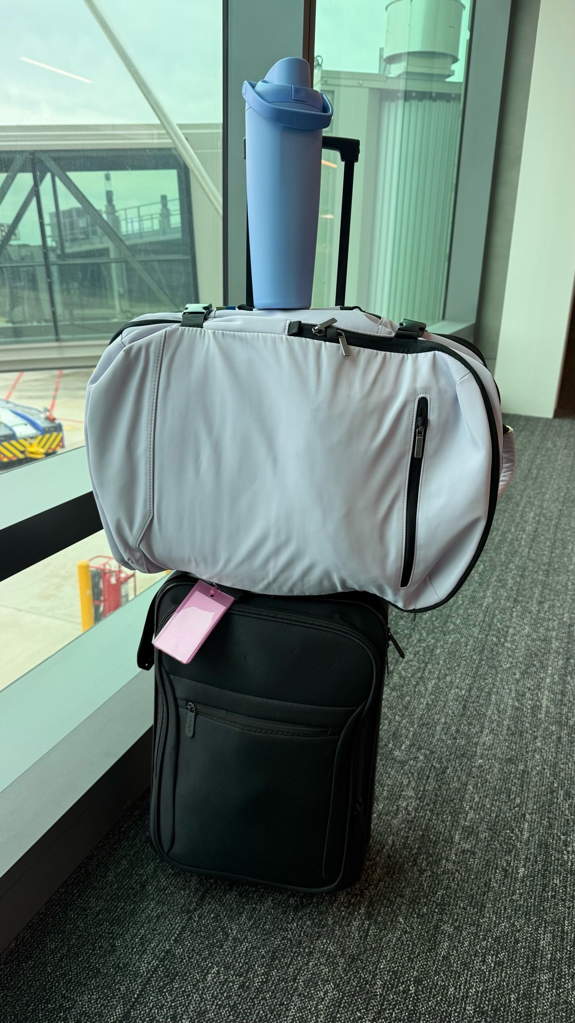 This duffel held SO much more than I expected and still slid right onto the suitcase without fighting me through the airport. Even linked the luggage tag because apparently I’ve entered my “organized travel mom” era now 😂✈️ #affiliate

#LTKTravel #LTKmomlife #LTKSeasonal
