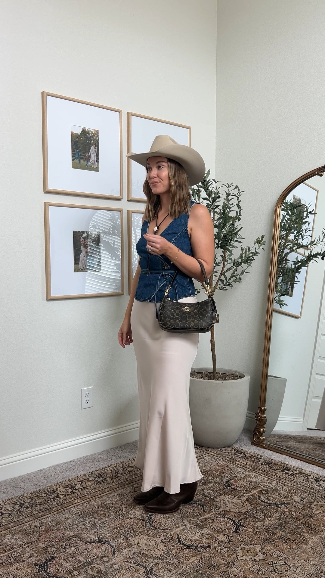 rodeo 🤝🏼 a denim vest 💙🤠 paired with my favorite satin maxi skirt & tecovas of course 💁🏻‍♀️ love the details on this denim vest & it fits like a dream! ✨

Vest & Skirt US6 @showpo #showpo 
Boots TTS (seriously so comfy)

#westernfashion #rodeofashion #styleinspo western fashion, Houston rodeo, #houstonrodeo #rodeohouston

#LTKootd #LTKSeasonal #LTKFestival