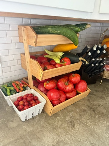 A convenient and cute way to store produce fresh from the garden! The three tier shelf holds so much and helps my counter look less cluttered! These ceramic baskets are adorable and could hold so many different things!  

 #LTKmomlife #LTKSeasonal #LTKHome