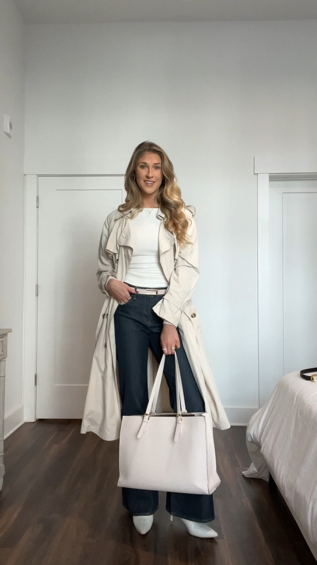 beige trench coat, white long sleeve top, cream belt, dark wash flare jeans, denim, cream work bag, white kitten heels, office outfit, work style ideas

#LTKfindsunder100 #LTKshoecrush #LTKfindsunder50