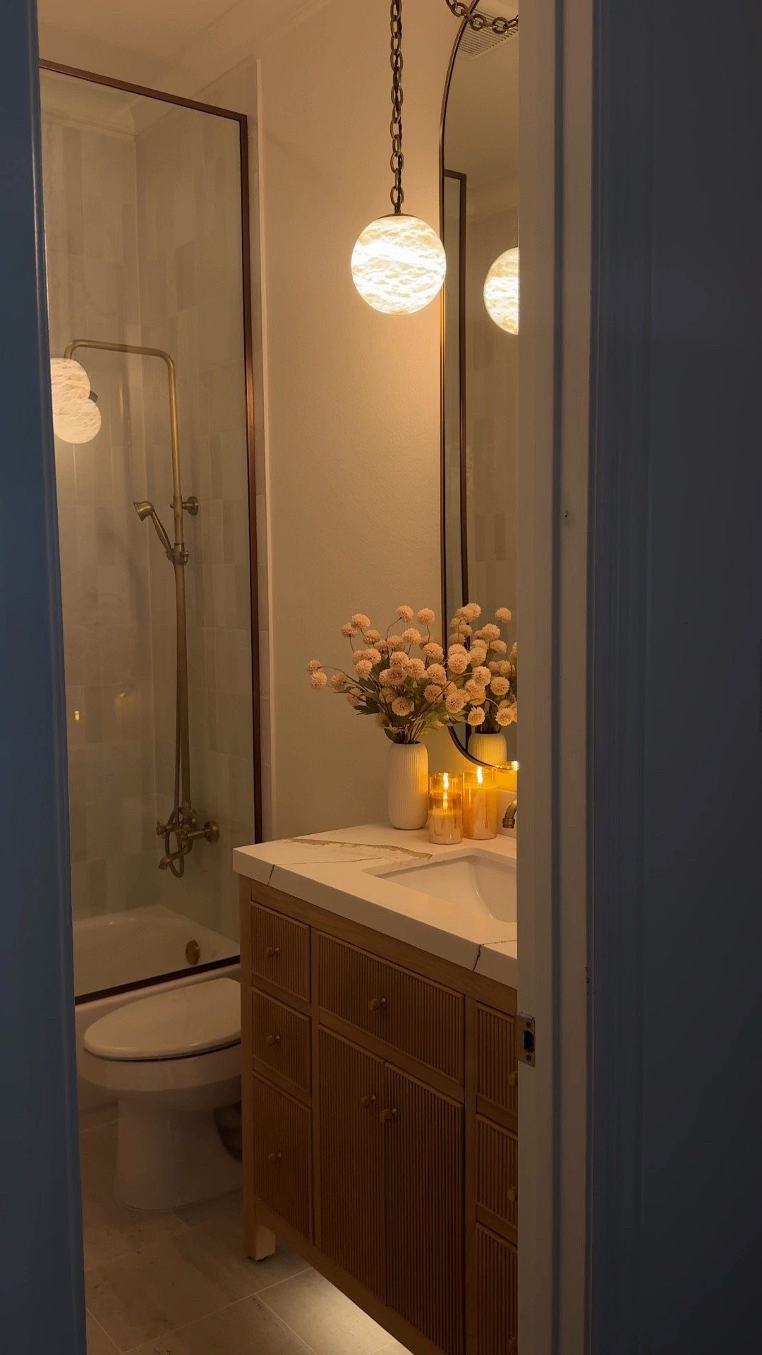 Our pool bath is officially finished with the remodel! 

Unable to link mirror which is Ethnik
and light is Lucent Lightshop 

#LTKHome #LTKStyleTip #LTKMostLoved