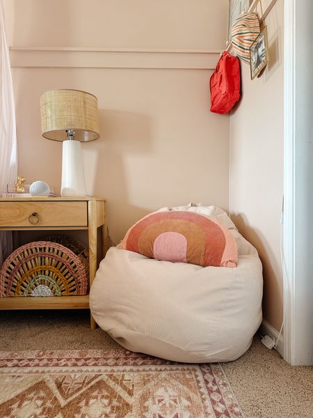Cozy corner in a pre-teens room, beanbag for stuffed animal storage or bedding storage, peach pink room, girls room, rainbow pillow, home decor 

#LTKhome #LTKfamily #LTKkids