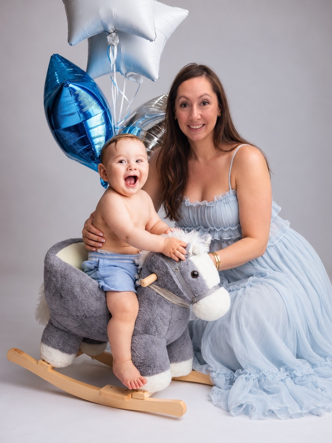 A moment of simple joy with a rocking horse and balloons. The best way to keep things light is to choose the simplest tools for play.

#LTKmomlife #LTKstorytime #LTKSeasonal