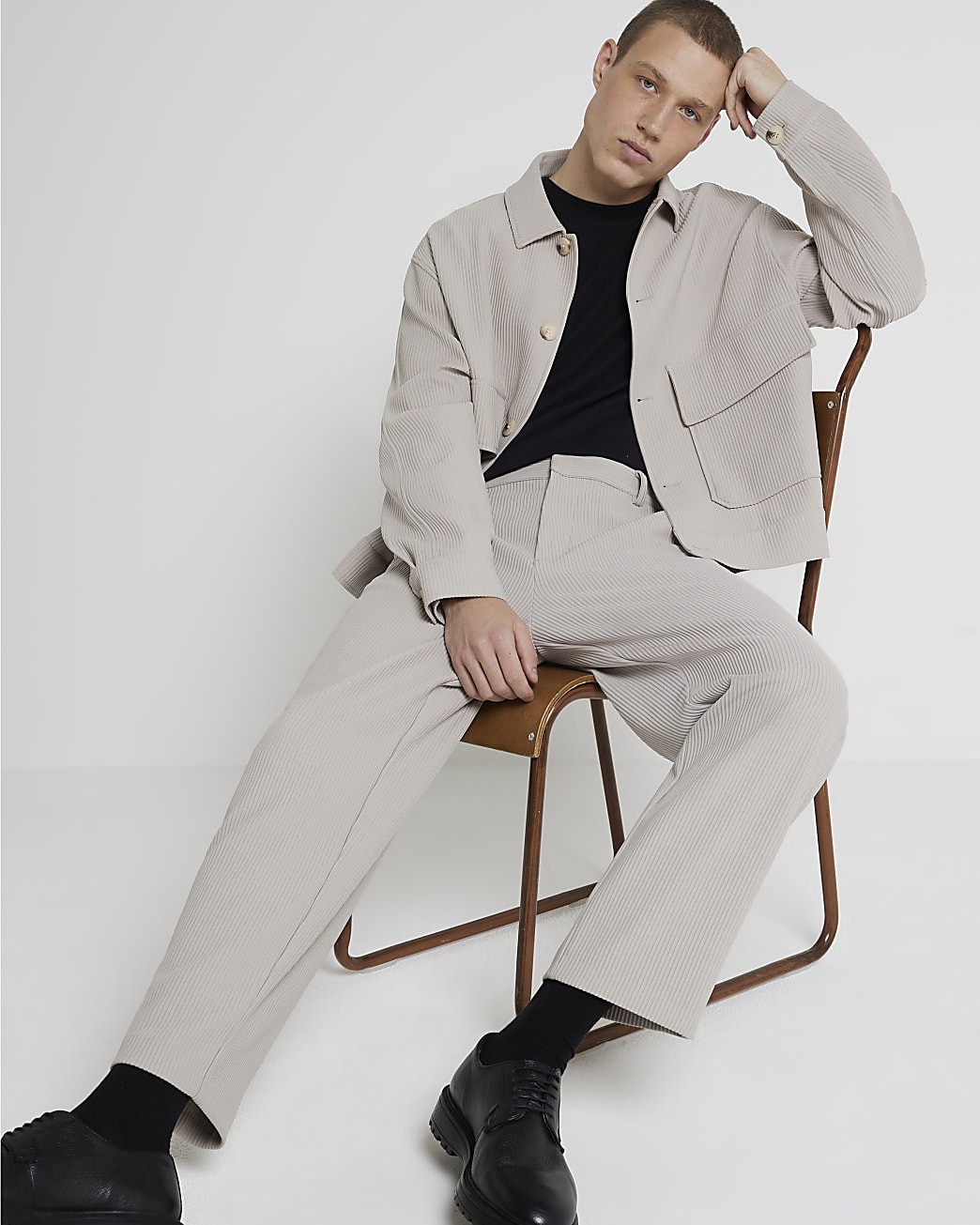 Ecru tapered fit plisse smart trousers | River Island (UK & IE)