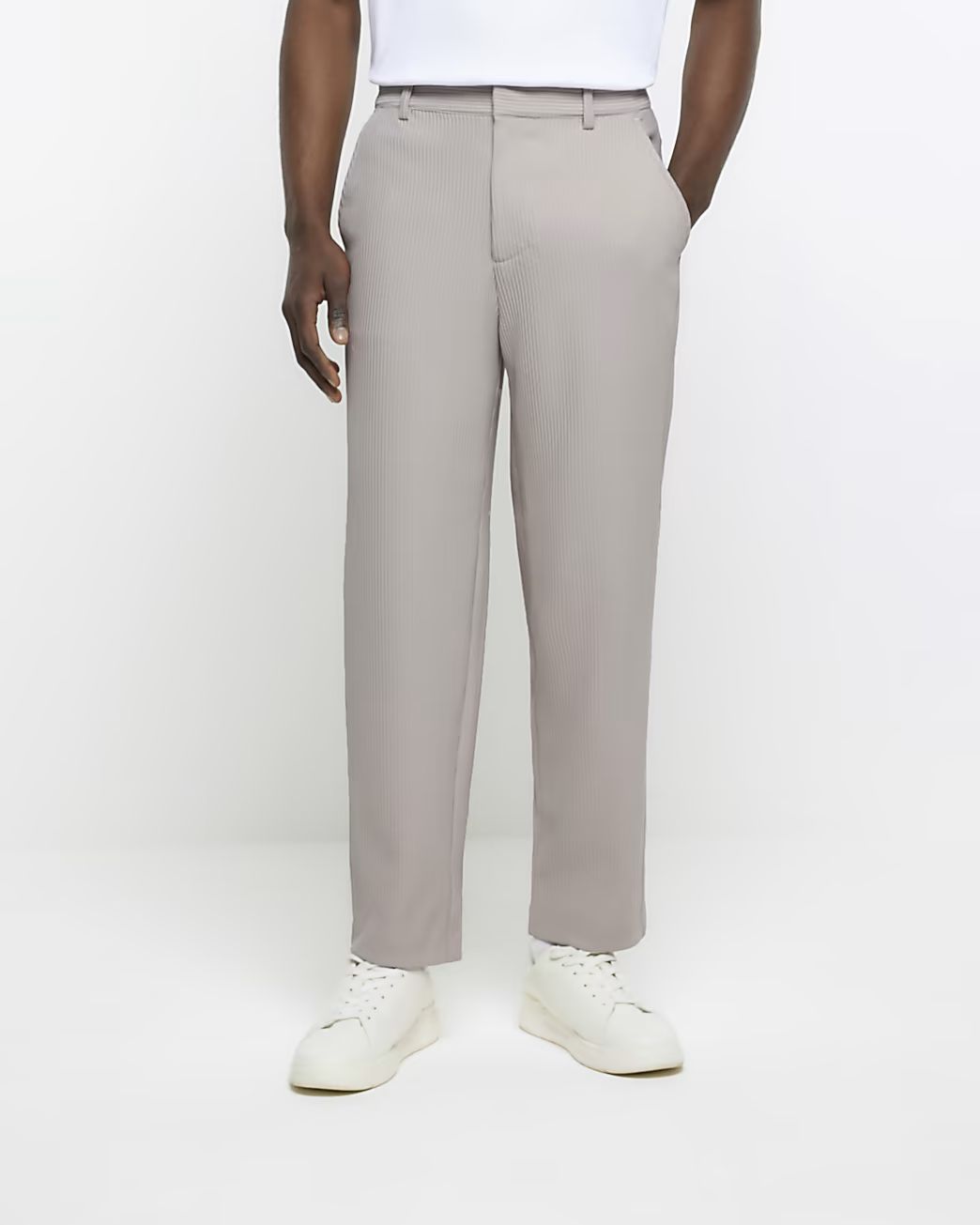 Ecru tapered fit plisse smart trousers | River Island (UK & IE)