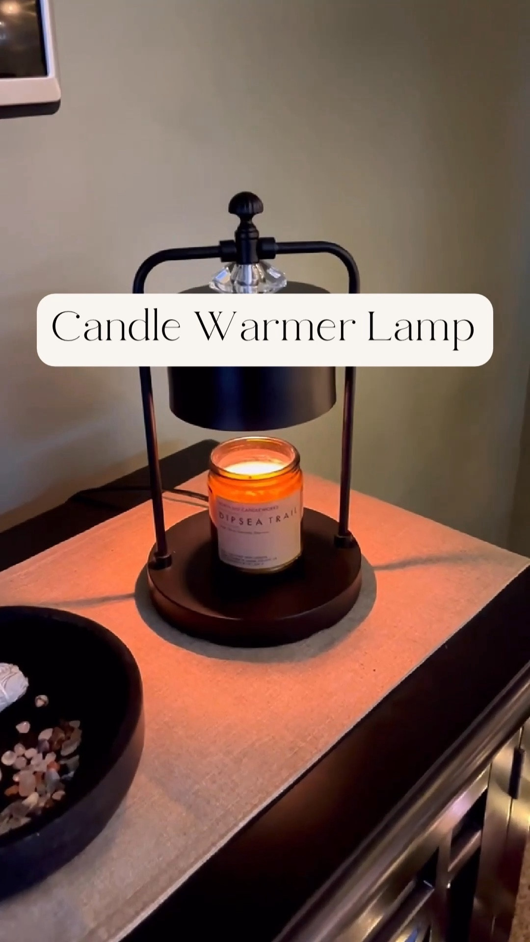 This Candle Warmer Lamp is my absolute favorite gift that I received this year.

It comes with a dimmer switch with 3 levels of brightness and a shut-off timer, and creates the perfect environment to relax. The scent is diffuse and not overpowering so my migraines aren’t triggered like with burning candles.

#LTKfindsunder50 #LTKhome #LTKVideo