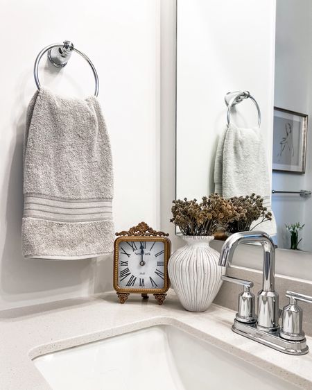 I love having a pretty clock in my bathroom. This one is perfect for keeping me on time.

Home decor, table clock 

#LTKhome #LTKfindsunder50 #LTKstyletip