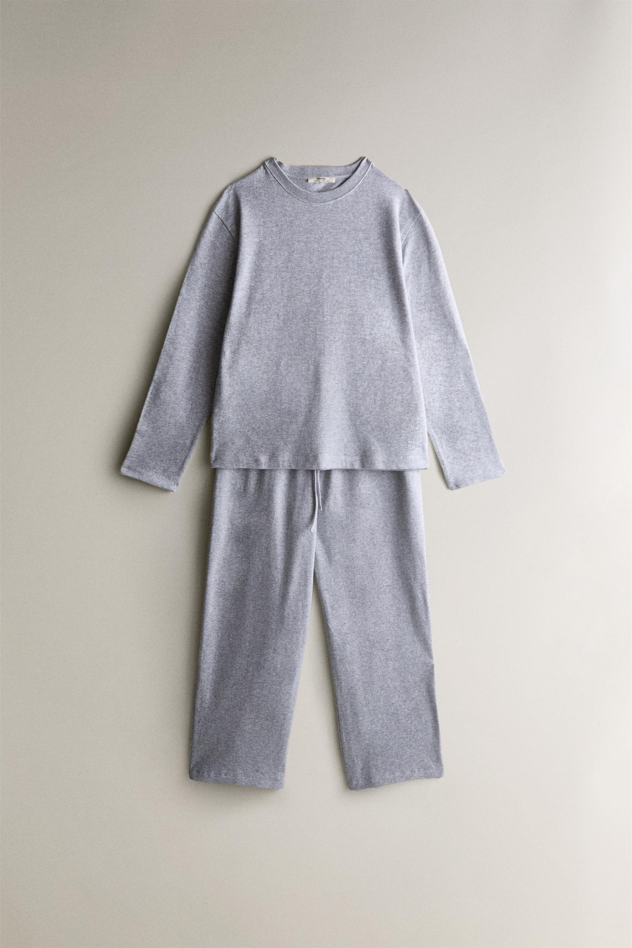 Cotton pants with an elastic waistband and a solid design. | Zara US