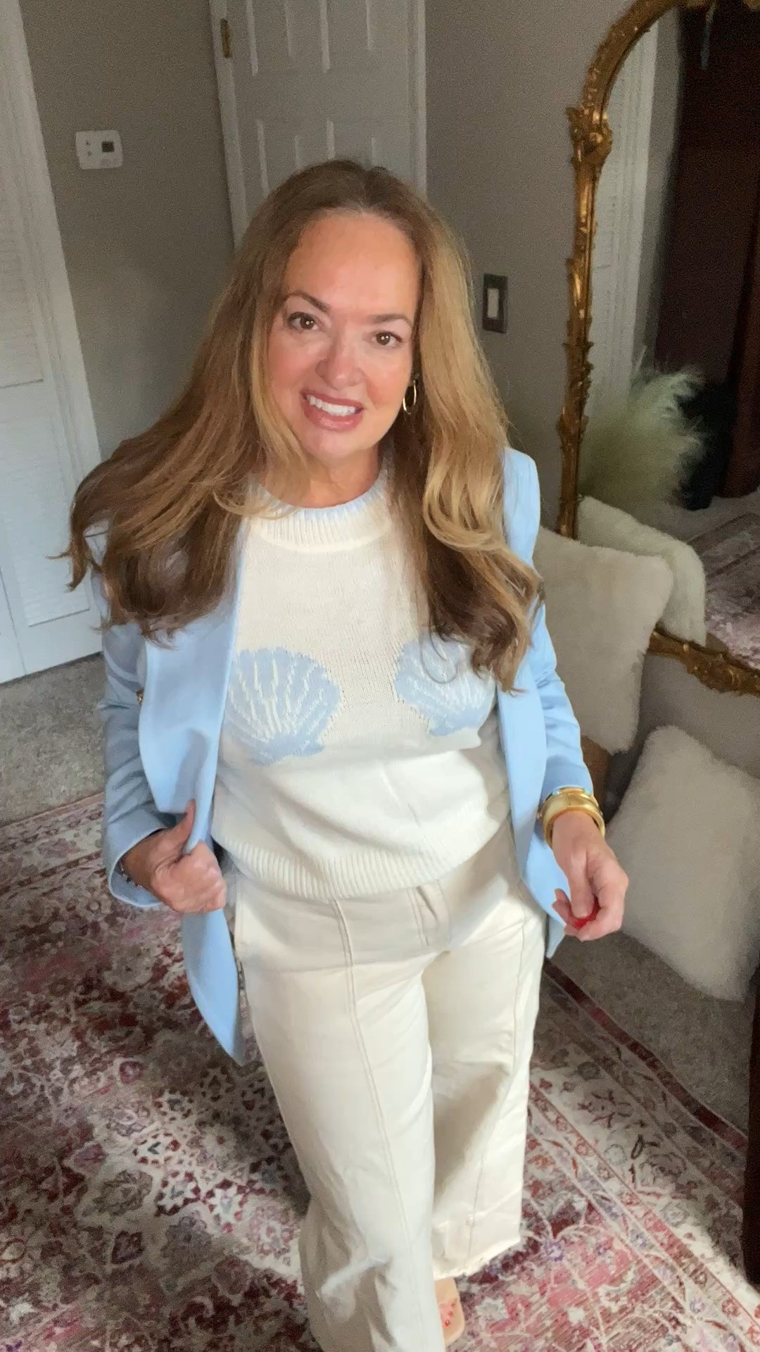 Baby blue seashell sleeveless sweater with creme denim and platform slides in neutral

#LTKootd #LTKgrwm #LTKTravel