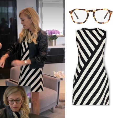 Sutton Stracke’s Black and White Striped Dress and Reading Glasses
