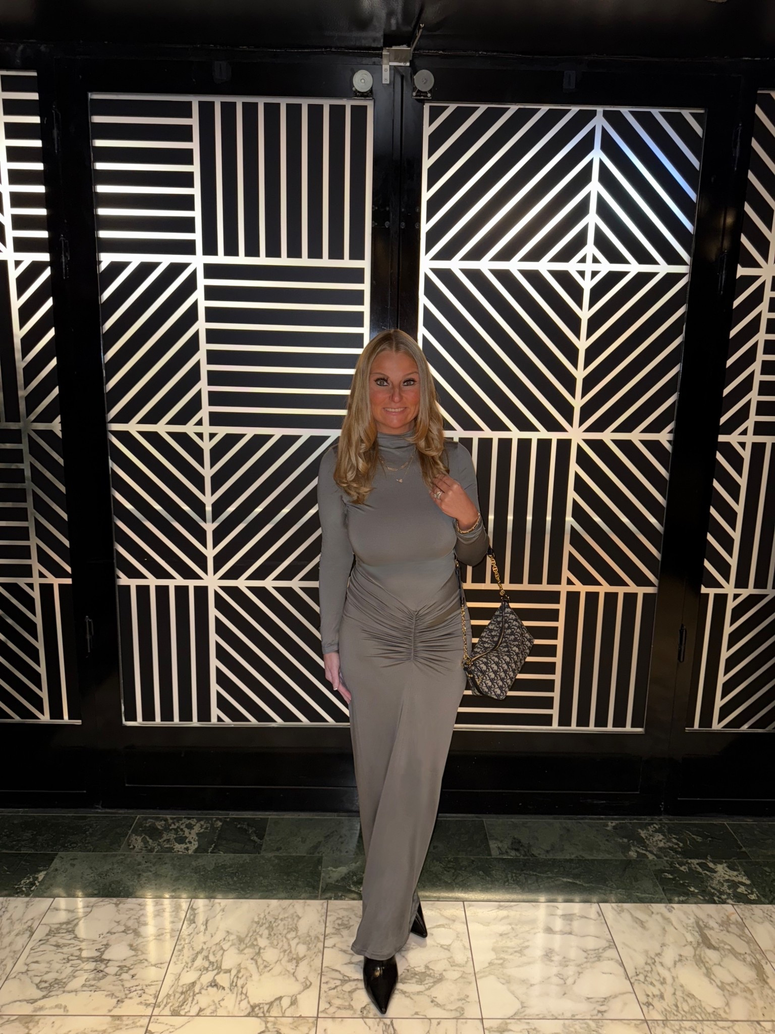 This Amazon dress looks like it’s designer. I received so many compliments. I love the gray color, which gives a bit of a silver tone.  I paired with high boots and gold jewelry.

#LTKGiftGuide #LTKCyberWeek #LTKgrwm