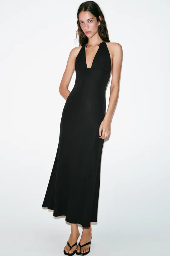 Long halterneck dress made from a flowing fabric. Featuring a metallic choker detail. Flared hem. | Zara UK