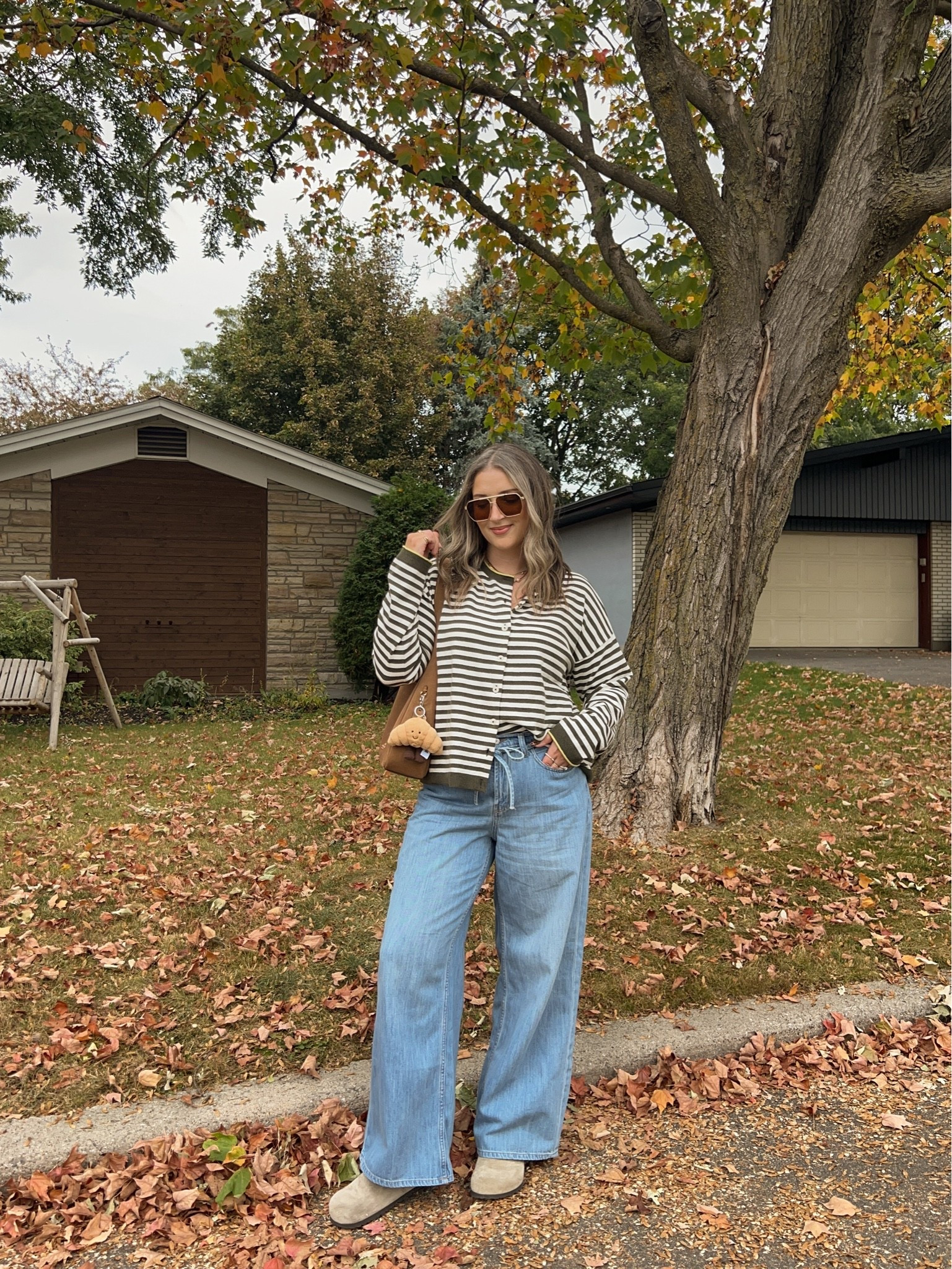 Casual fall outfit! Wearing M in the striped cardigan and 12 in the jeans (Canadian jeans link under “similar products”). I’m a 9.5-10 shoe and wear a 40 in the Birkenstocks

#LTKfall #LTKjeans #LTKstyletip