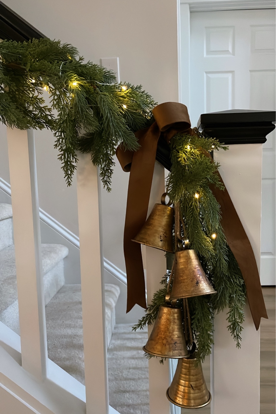 Christmas decor - garland - bells - velvet ribbons 

#LTKHome #LTKHoliday #LTKSeasonal