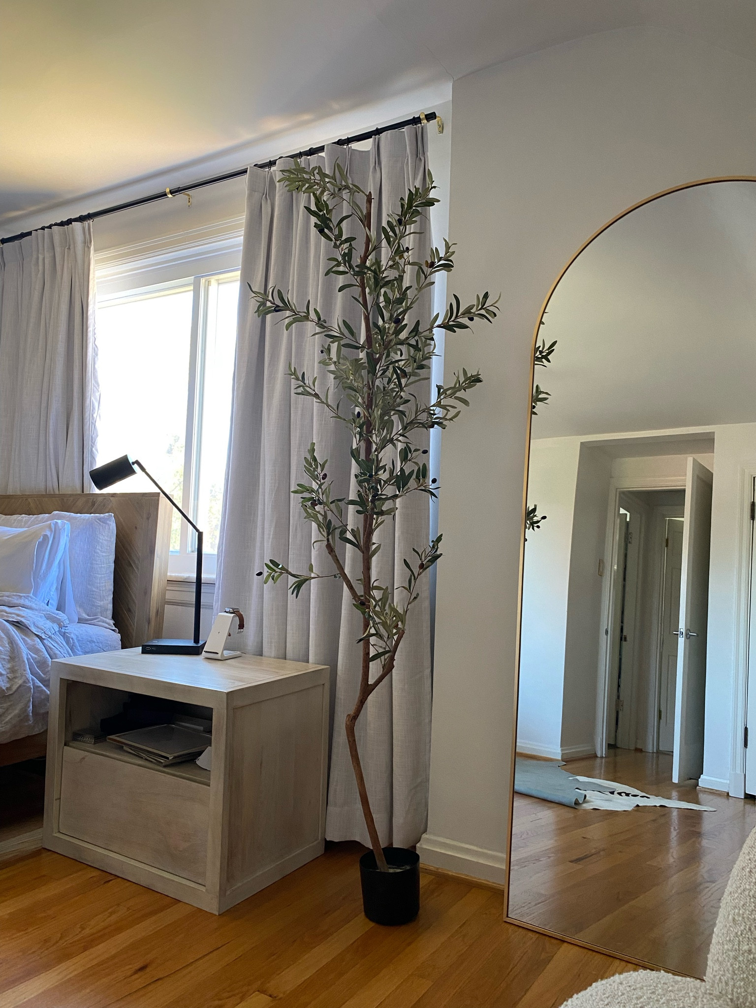 Faux olive tree. I like this tree for the price, but you can see glue in some areas.