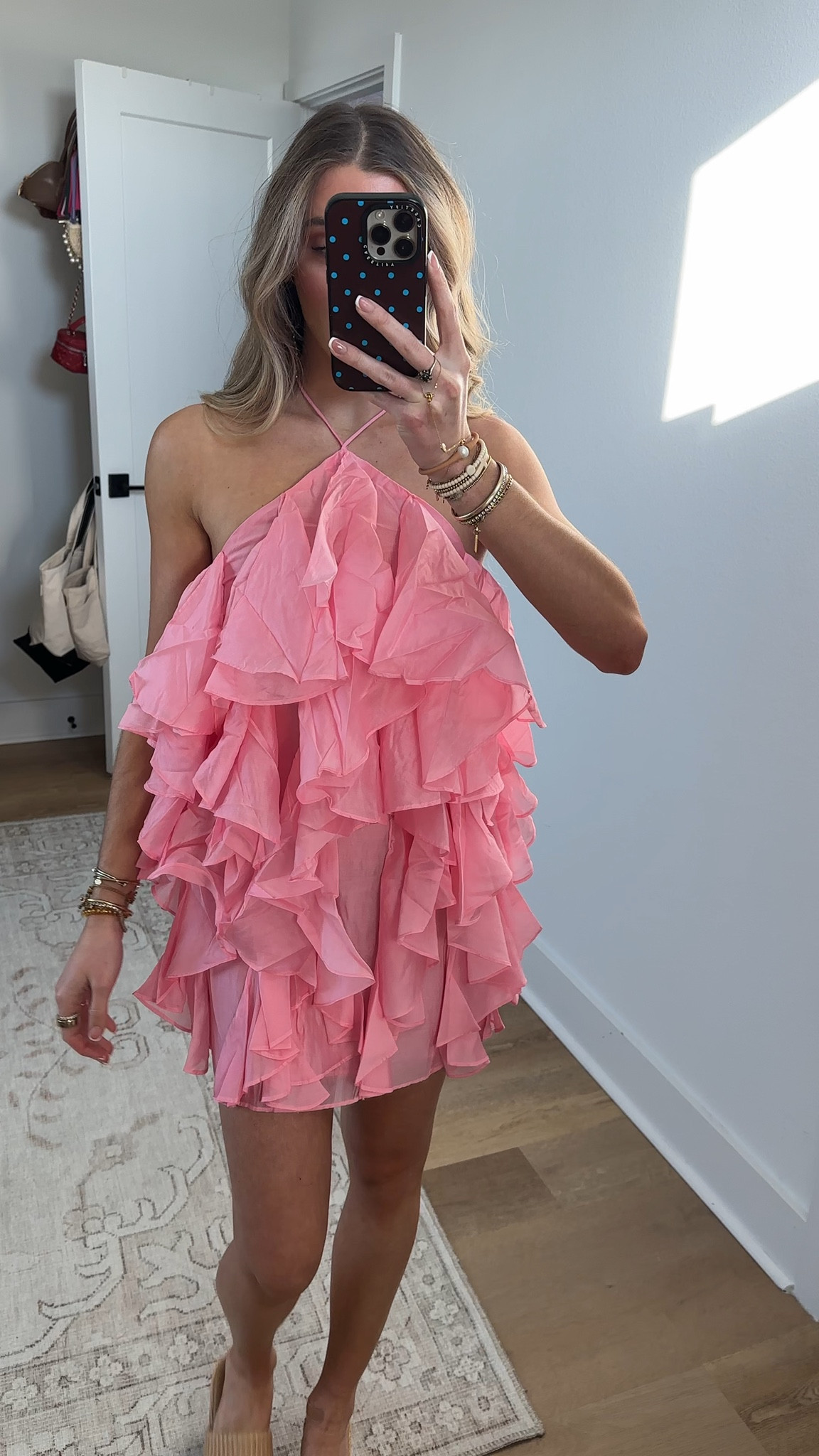 Showpo size 2. With its flirty halter neck and ruffle tiered design, the Carlson Mini Dress is all about making your statement outfit dreams come true. The bold pink hue brings a dose of Euro summer style to any occasion, think rooftop cocktails or sunset picnics, and those fluttery layers move with you for maximum charm.
Pair this mini dress with chunky rain boots for an unexpected twist, or opt for fine jewellery and strappy sandals to channel quiet luxury vibes. Whether you're dancing the night away or brunching in the city, Carlson turns every moment into a fashion-forward memory.

#LTKootd #LTKSaleAlert #LTKValentine