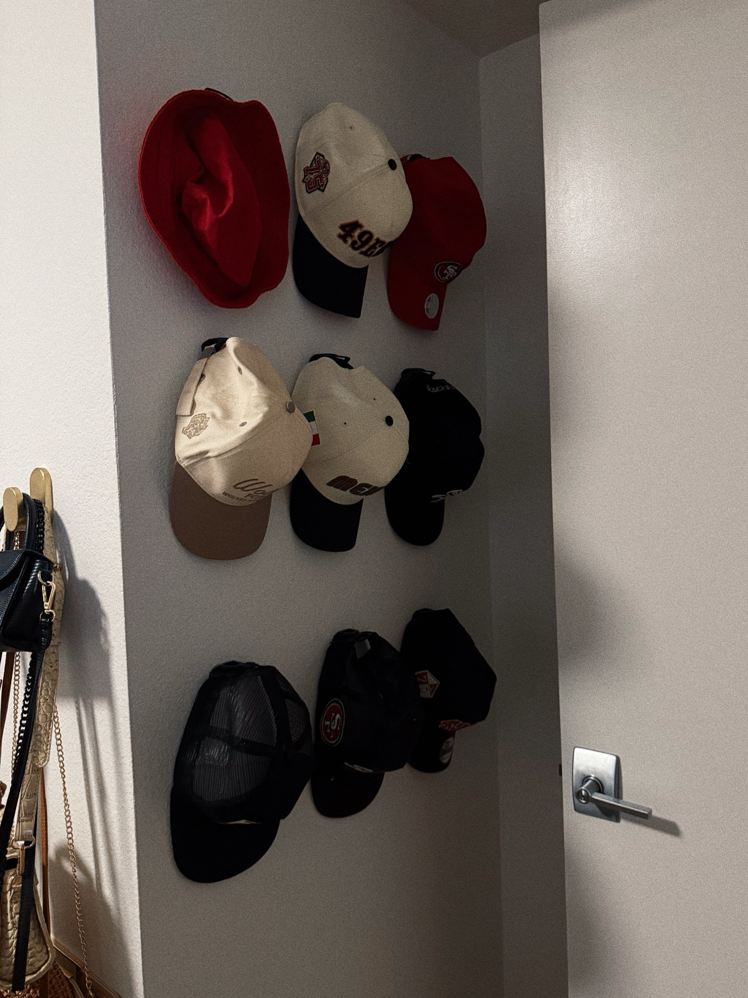 Wall hooks for hat organization! Best $8 spent 🧢🤝🏻 

#LTKHome #LTKCyberWeek #LTKSaleAlert