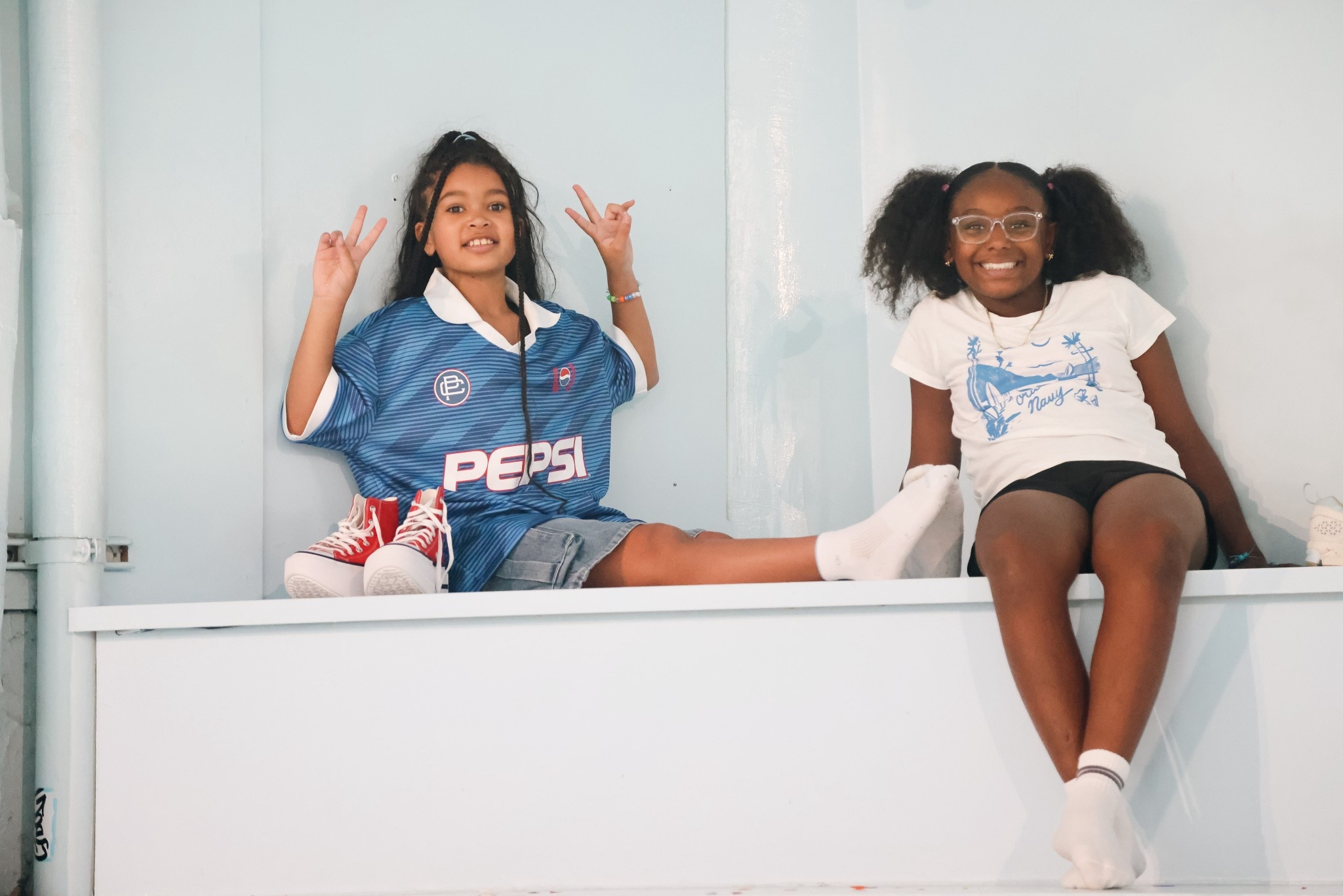 Loving this 90s look on Scarlett! Pepsi // jerseys // converse // girls fashion // jorts

#LTKShoeCrush #LTKFamily #LTKKids