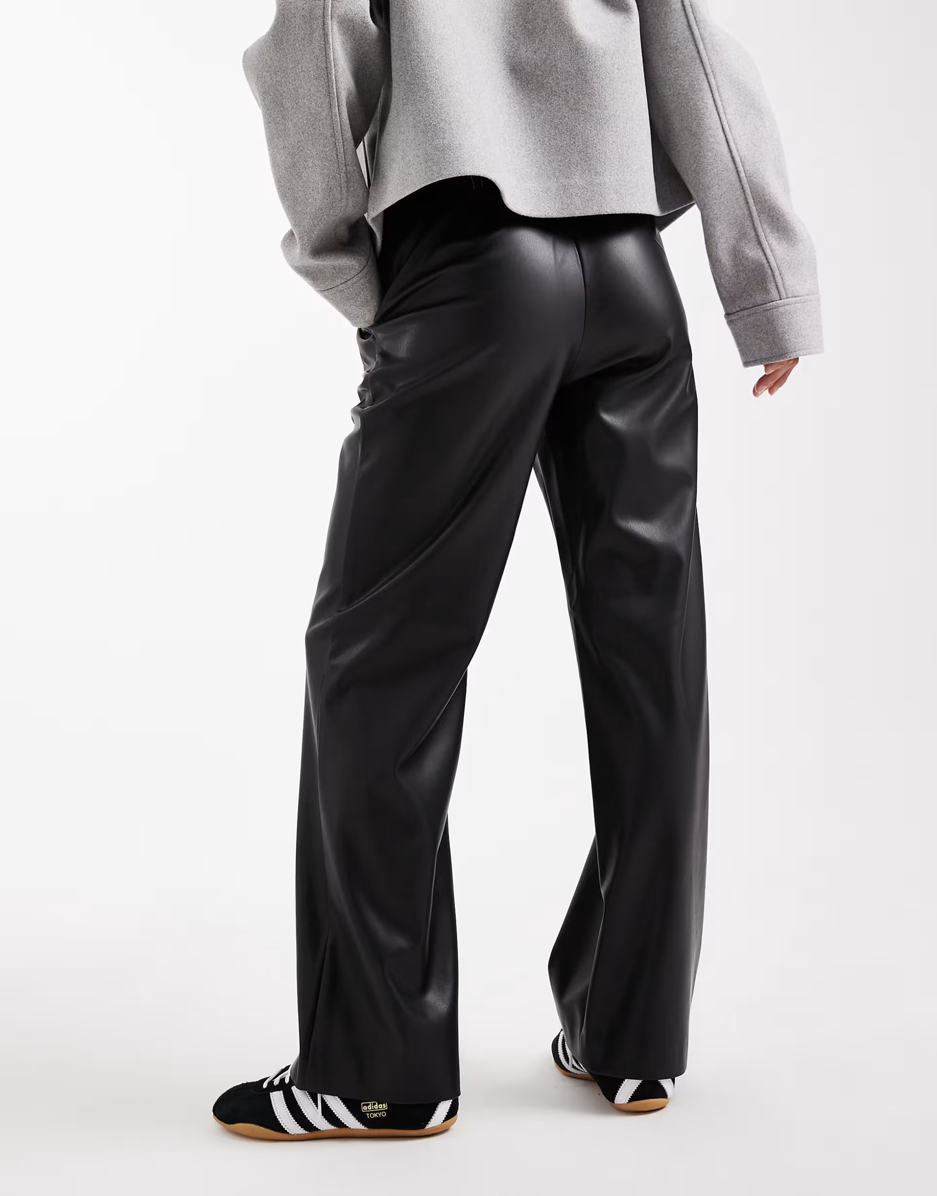 ASOS DESIGN Petite faux leather straight leg trousers in black | ASOS | ASOS (Global)