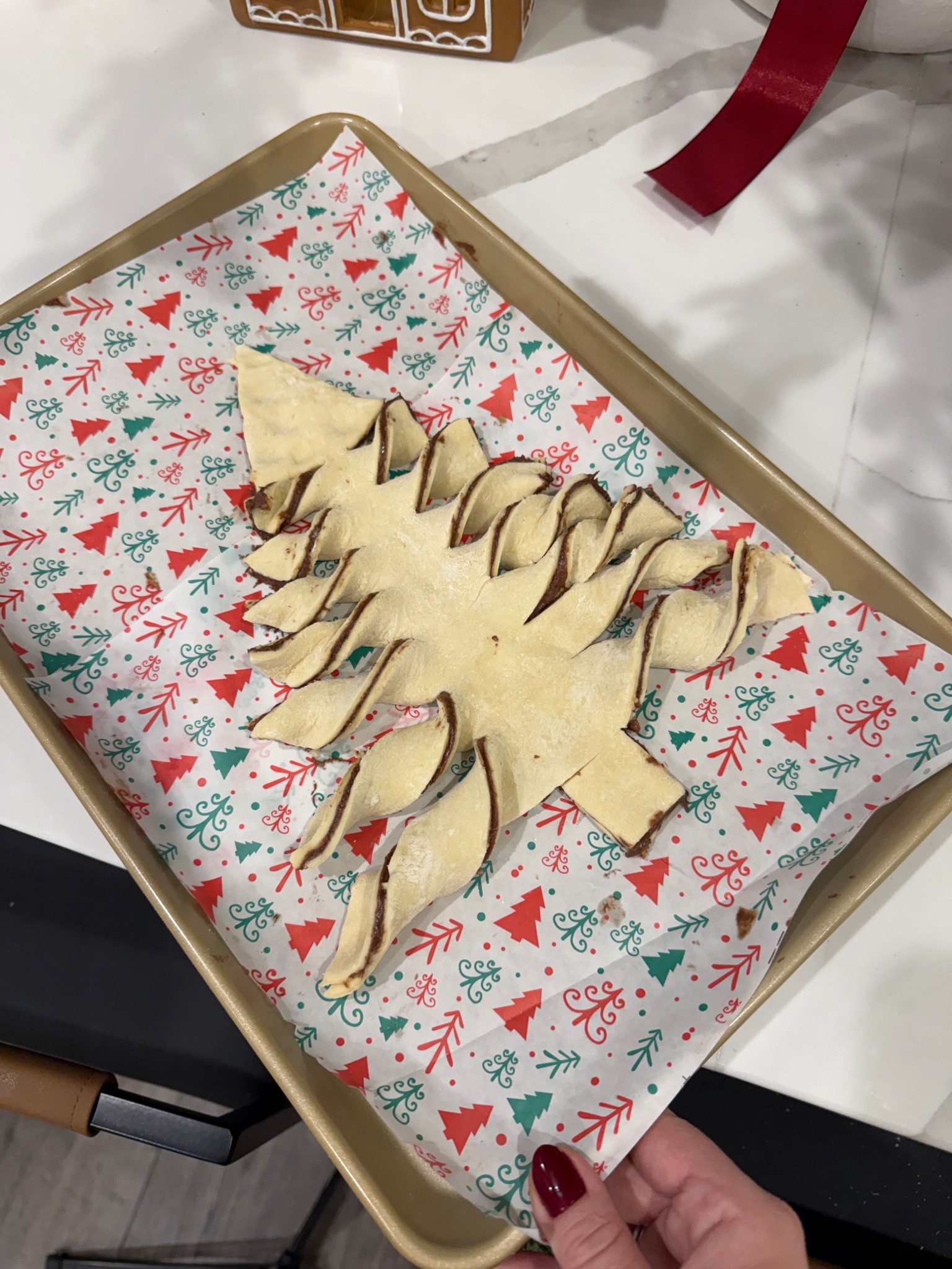 Cutest baking sheet and pan! We made a Christmas tree with Nutella puff pastry. 



#LTKHoliday #LTKSeasonal #LTKdayinmylife