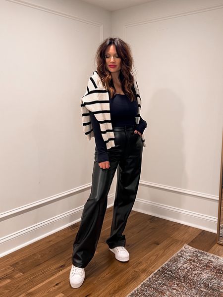 Entire outfit on sale! Wearing medium in bodysuit and 27 in pants that are relaxed fit. 

Travel outfit, faux leather pants, casual outfit

#LTKtravel #LTKstyletip #LTKCyberWeek