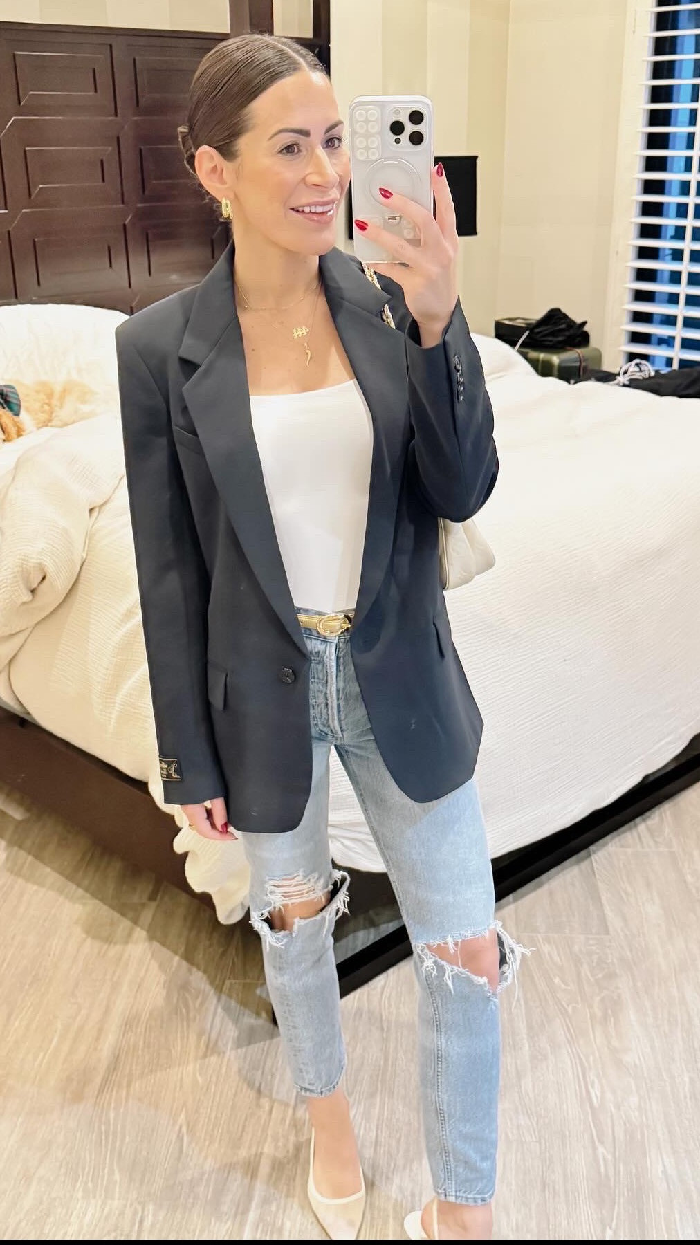Effortlessly elevated ✨ Loving this mix of polished and casual with a tailored blazer, classic white tank, and distressed denim. Perfect for a dinner date or a casual meeting that calls for chic vibes. And of course, my coziest little buddy in the background approves 🐾💛


Shop the look:
🖤 Blazer: 0
🤍 Tank: small
👖 Jeans: 25
👠 Heels: 37.5


#OOTD #ChicAndCasual #BlazerStyle #EffortlessFashion #LTKStyle 

 #LTKFindsUnder50 #LTKFindsUnder100 #LTKWorkwear