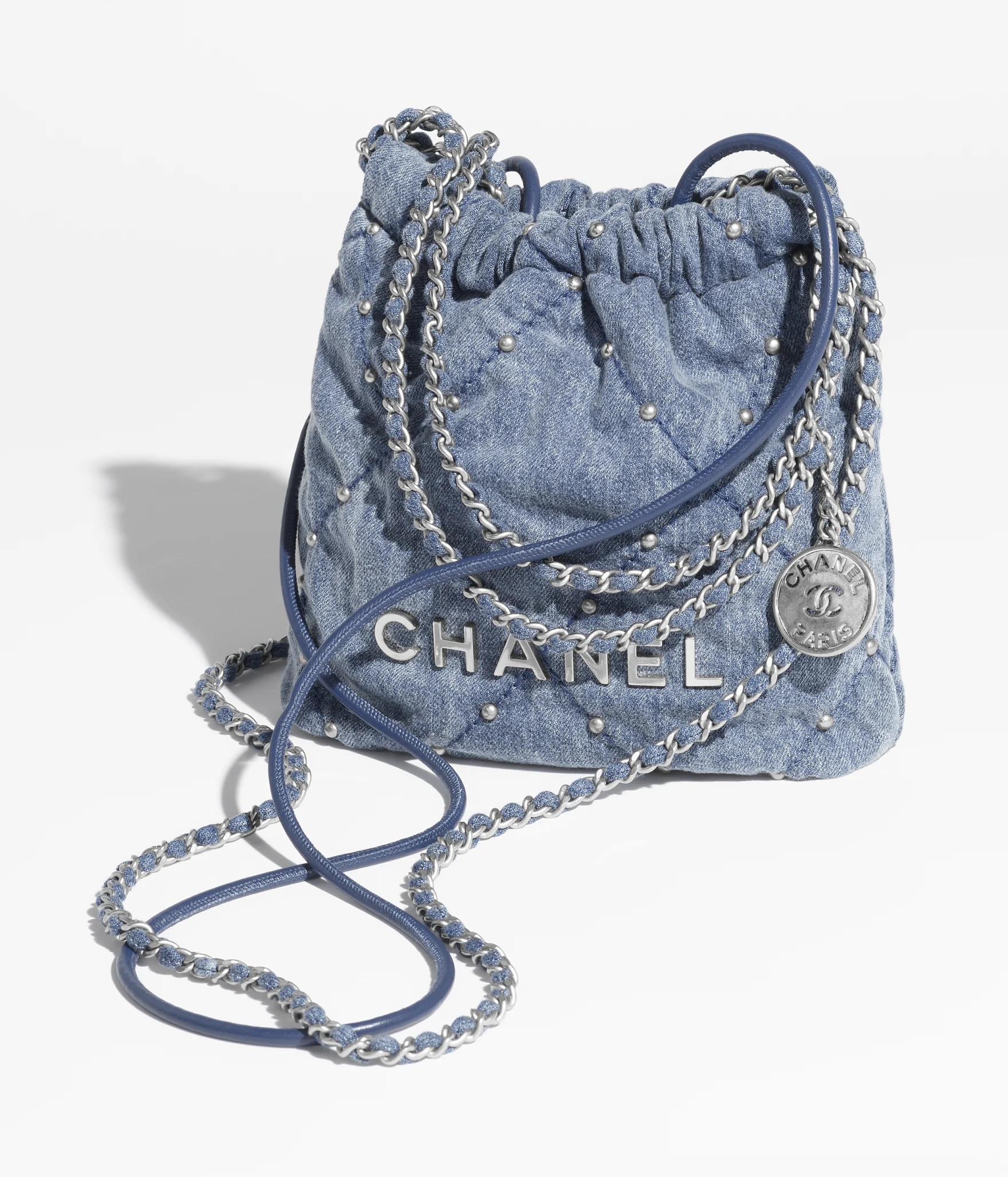 Chanel 22 mini handbag, Washed denim & silver-tone metal, blue — Fashion | CHANEL | Chanel, Inc. (US)